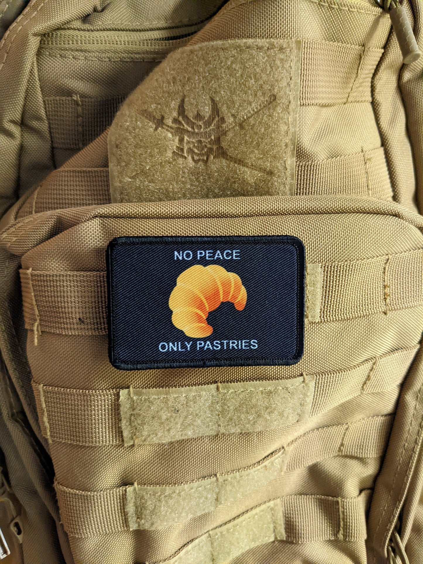 Croissant no peace only pastries 2"x3" morale patch with hook and loop backing