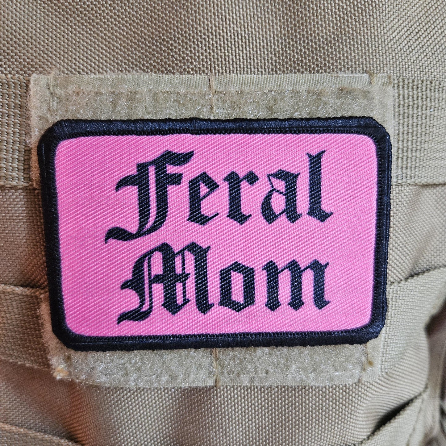 Pink "feral mom" girls and boys meme 2"x3" morale patch with hook and loop backing