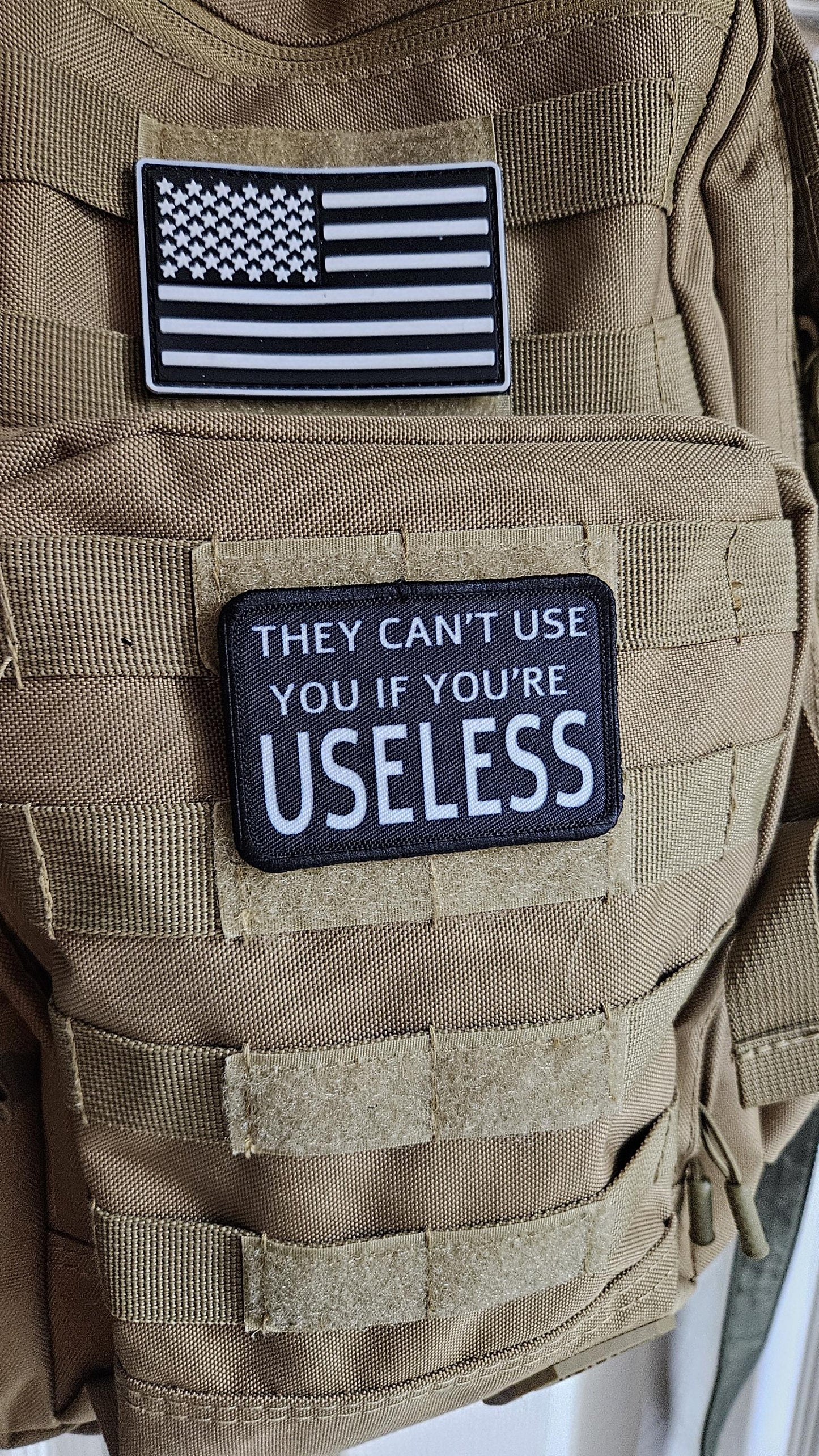They cant use you if you're useless meme 2"x3" removable morale patch with hook and loop backing black and white