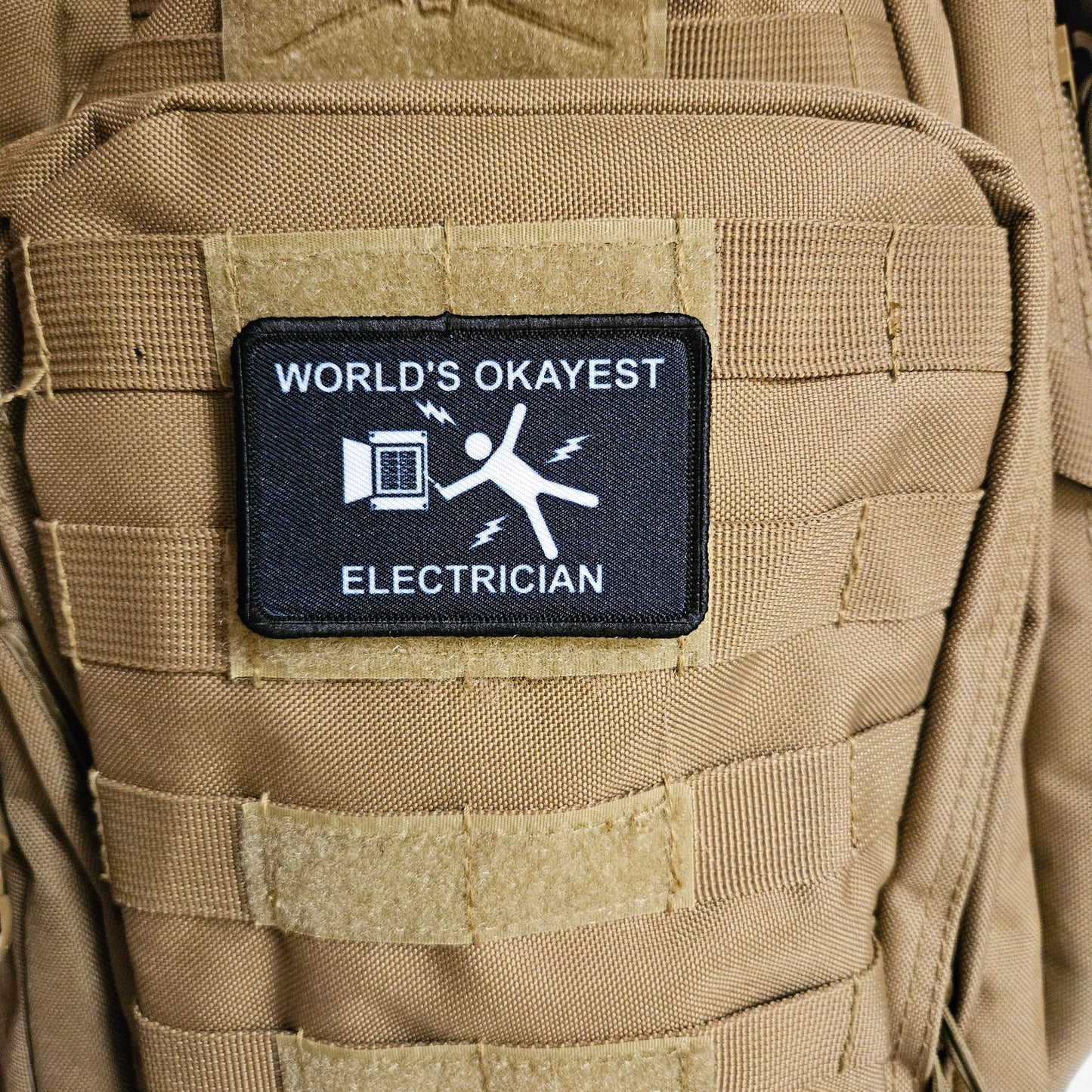 World's okayest electrician blue collar 2"x3" morale patch with hook and loop backing