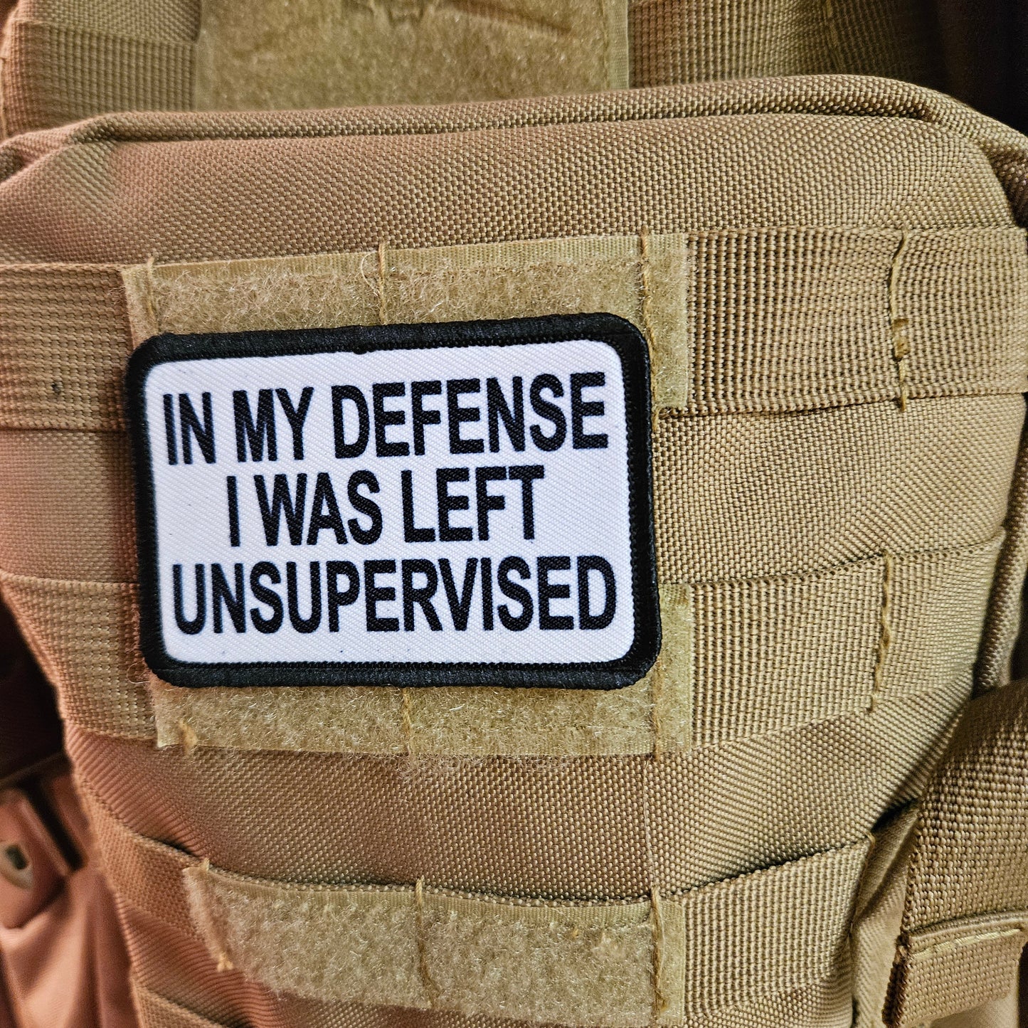 White In My Defense I was left Unsupervised removable patch 2"x3" morale patch with hook and loop backing