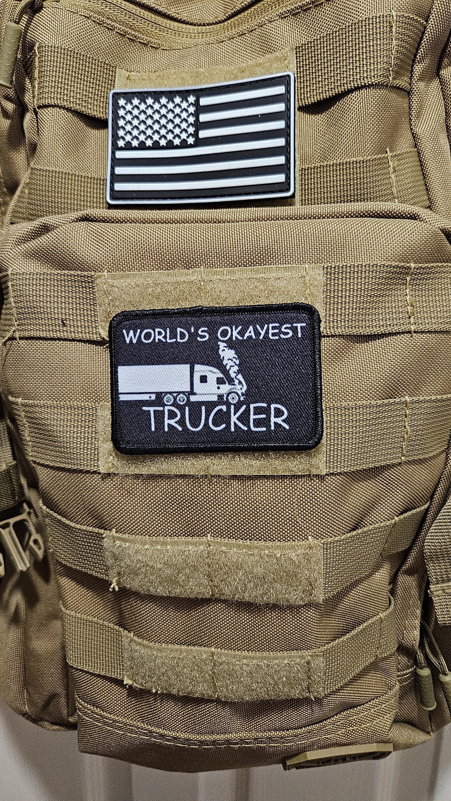 World's okayest trucker blue collar 2"x3" morale patch with hook and loop backing