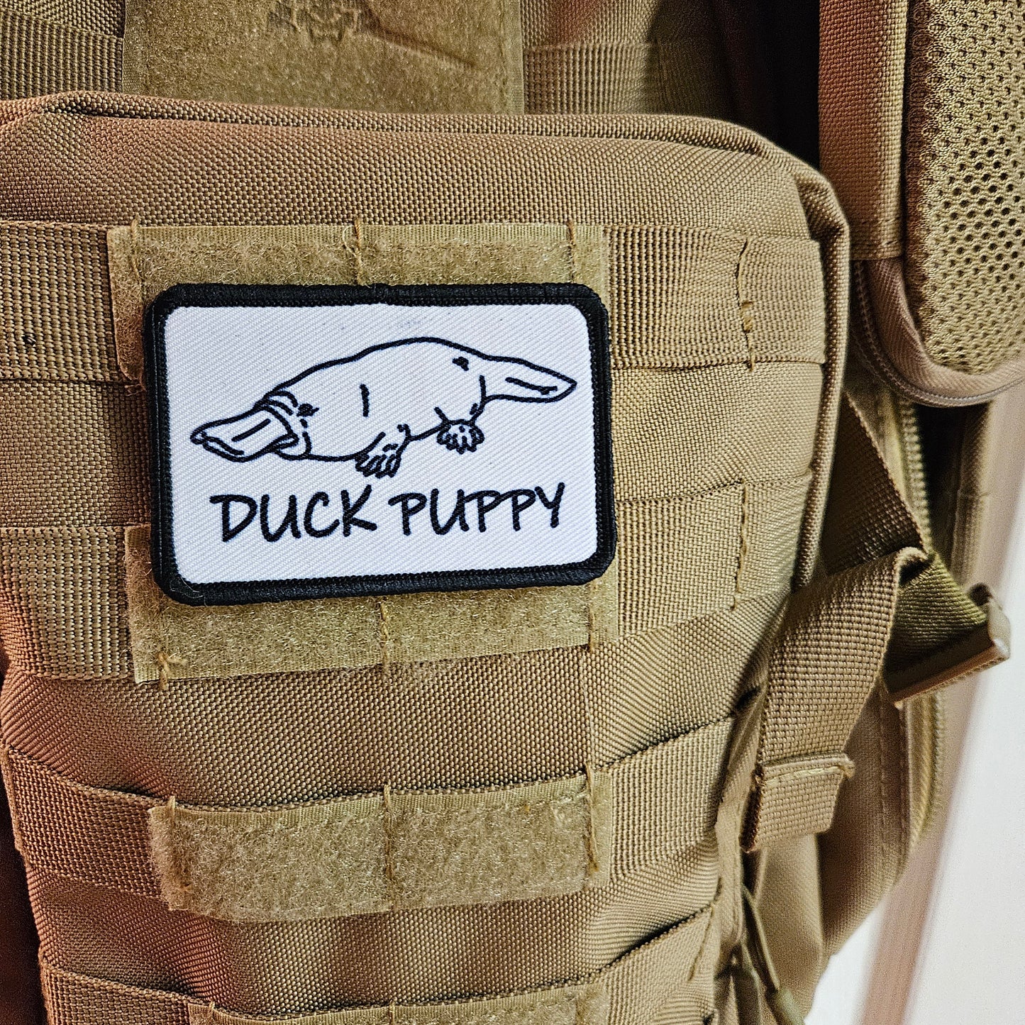 Duck puppy duck billed platypus white meme funny 2"x3" morale patch with hook and loop backing