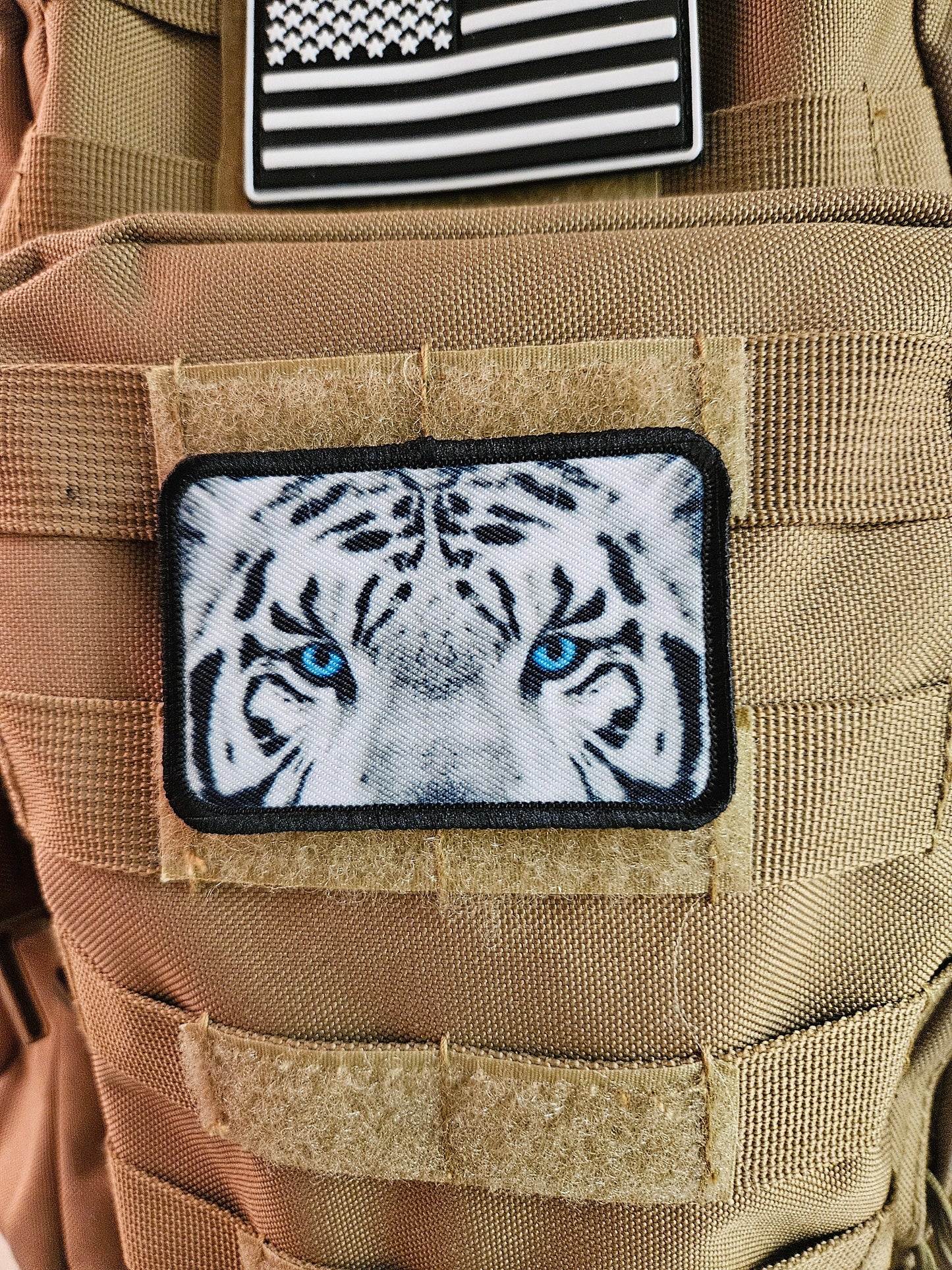 White tiger eyes 2"x3" morale patch with hook and loop backing