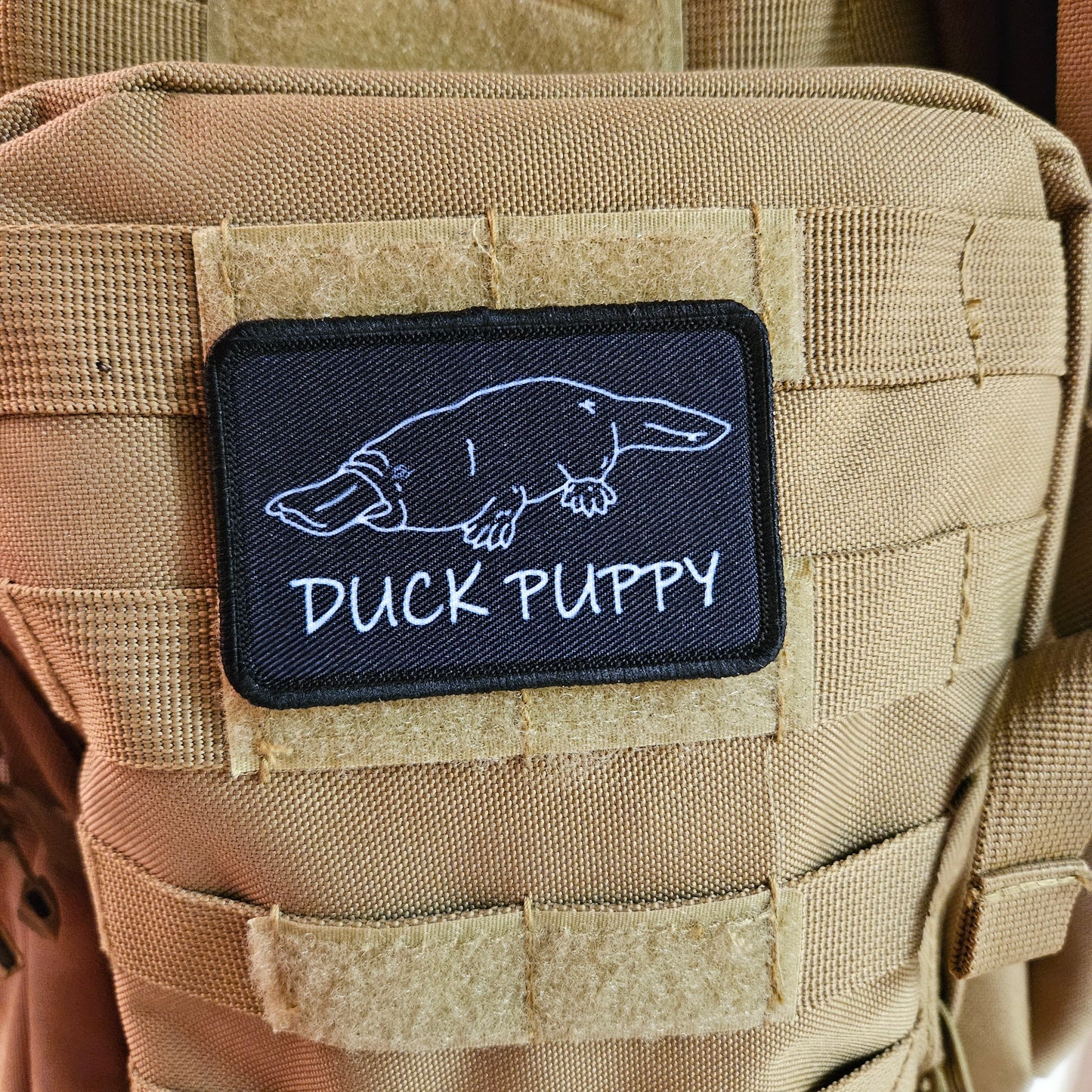 Duck puppy duck billed platypus black meme funny 2"x3" morale patch with hook and loop backing