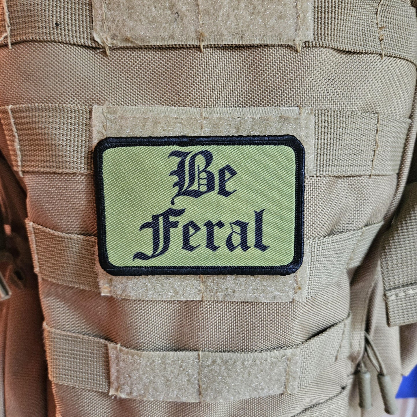 Green "be feral" girls and boys meme 2"x3" morale patch with hook and loop backing