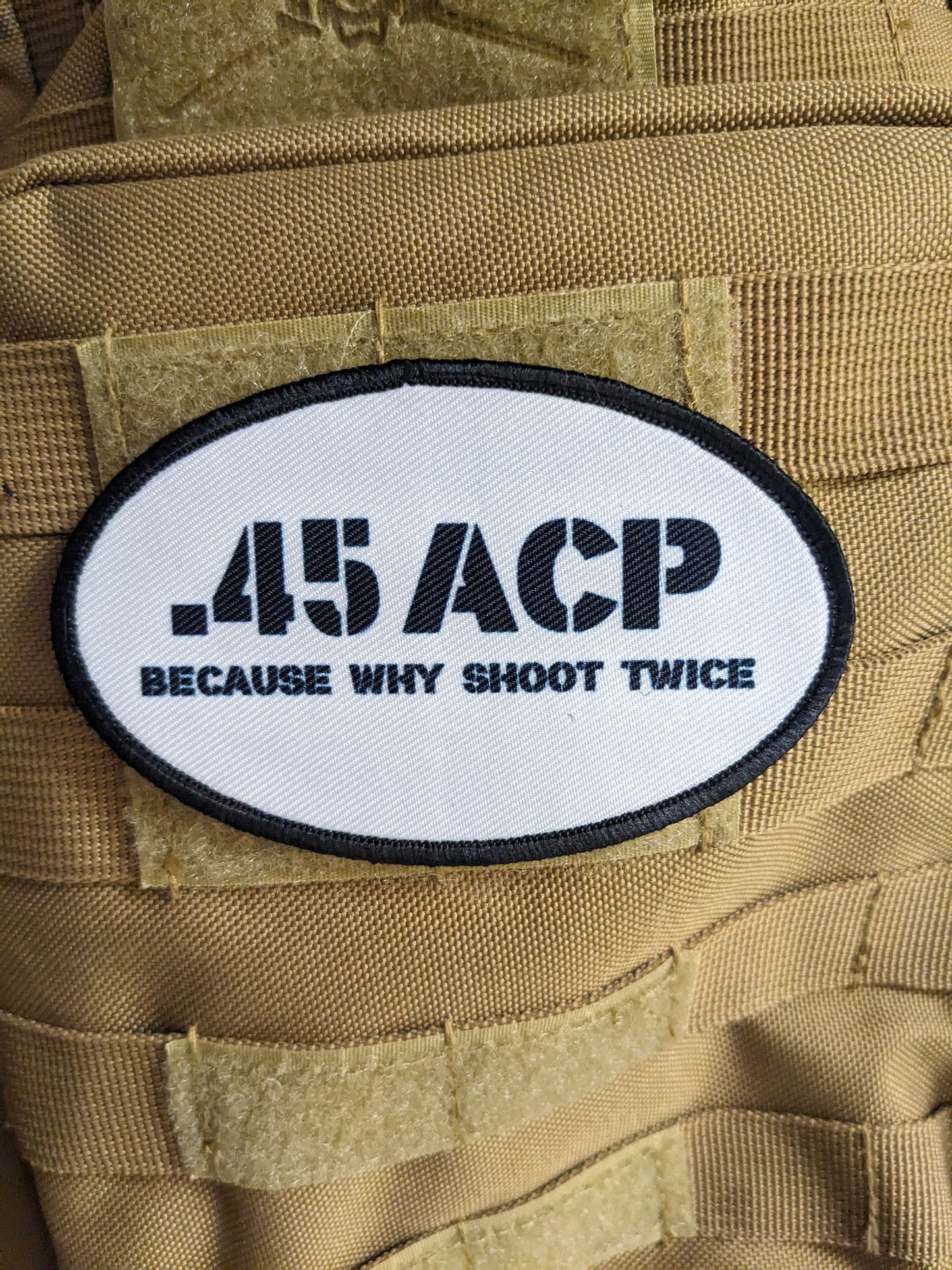 45 acp because why shoot twice running celebration joke 4"x2.5" oval morale patch with hook and loop backing