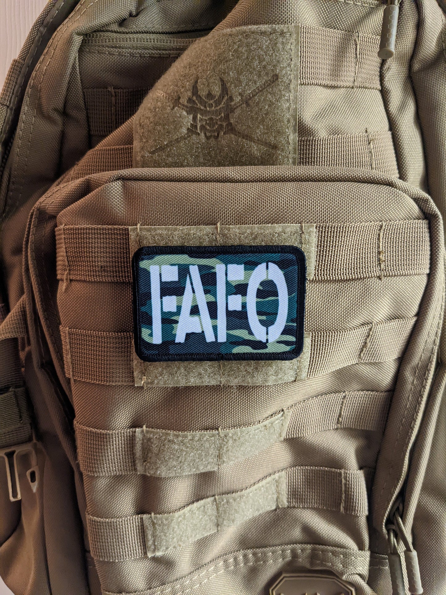 Fuck around and find out camo funny 2"x3" morale patch with hook and loop backing green background
