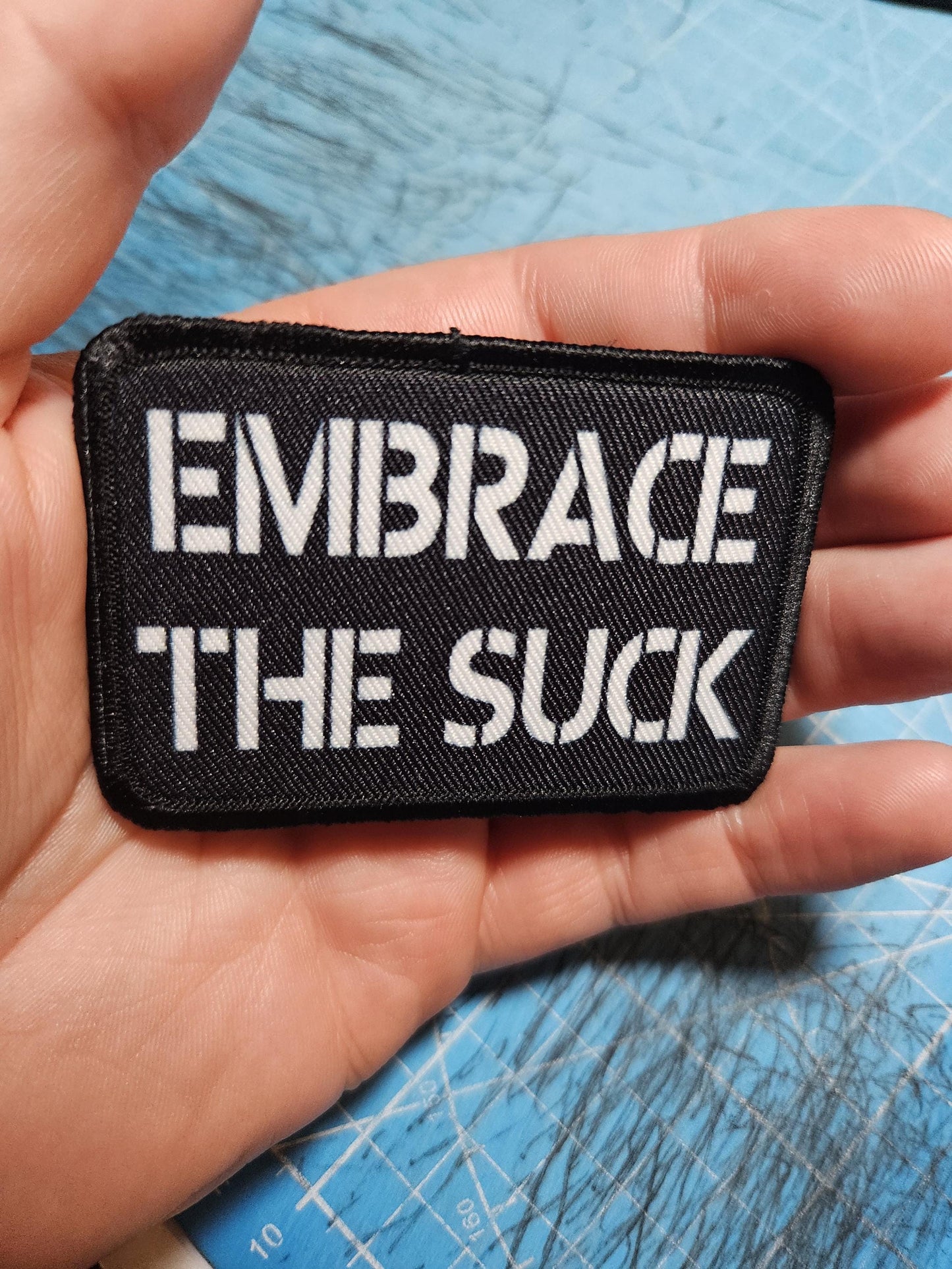 EMBRACE THE SUCK army military navy funny 2"x3" morale patch with hook and loop backing green background