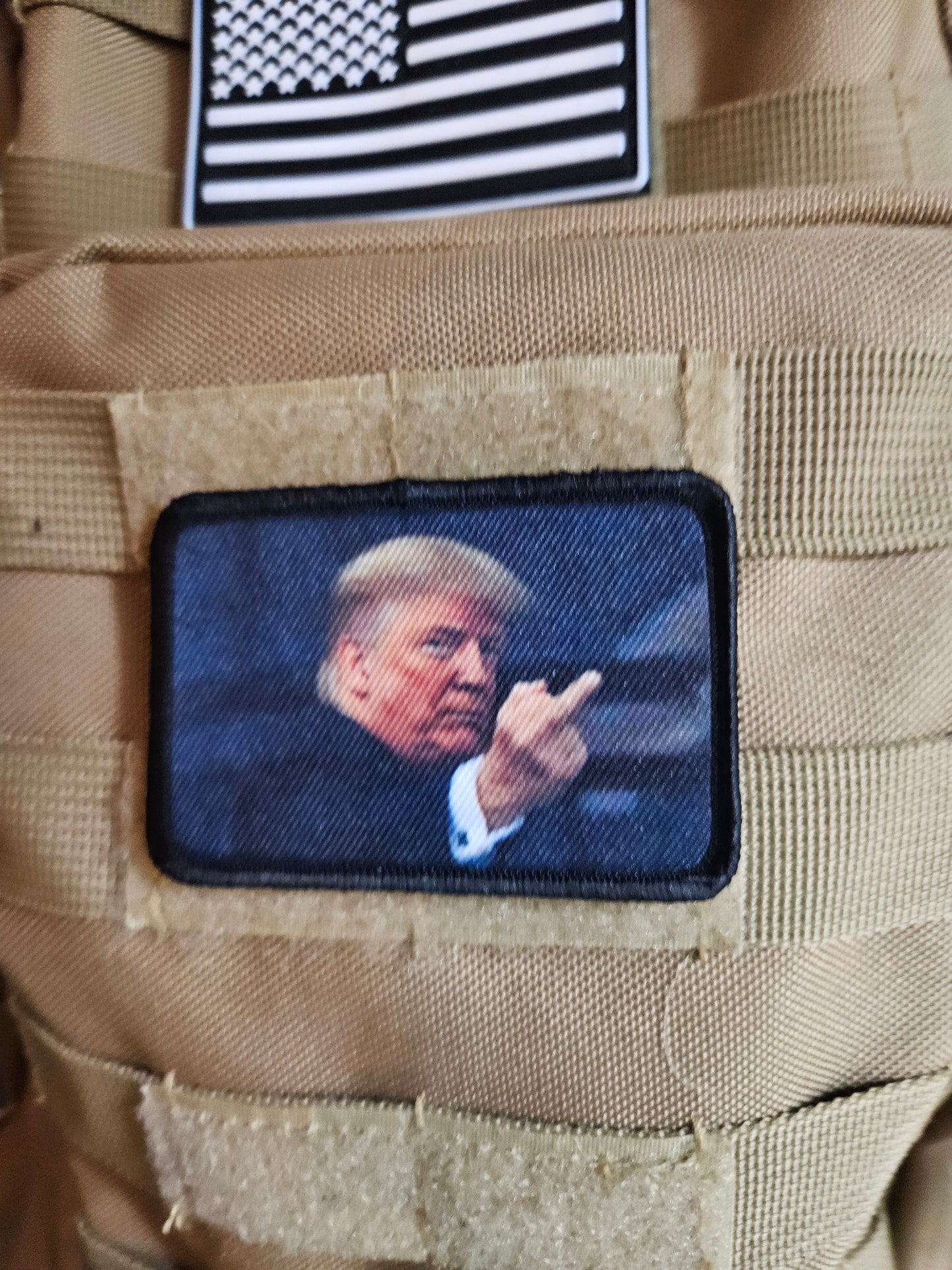 Trump flipping the bird 2"x3" removable morale patch with hook and loop backing