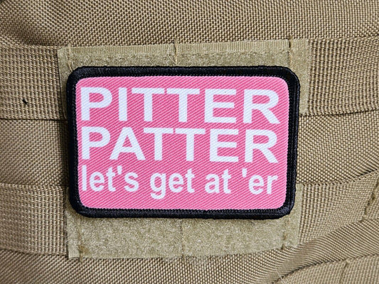 pink and white Pitter patter let's get at 'er meme 2"x3" removable morale patch with hook and loop backing