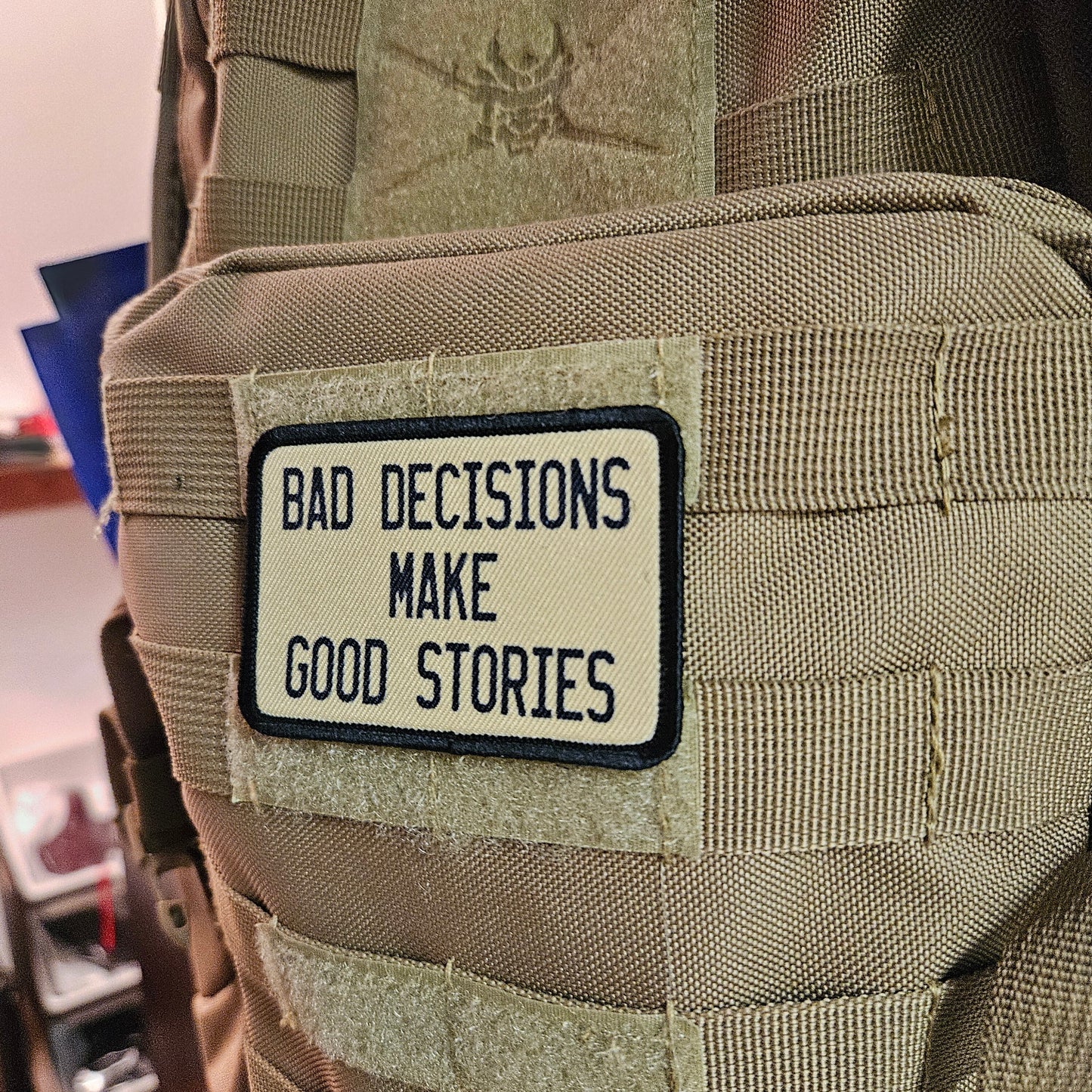 Bad decisions make good stories funny meme  2"x3" removable morale patch with hook and loop backing tan