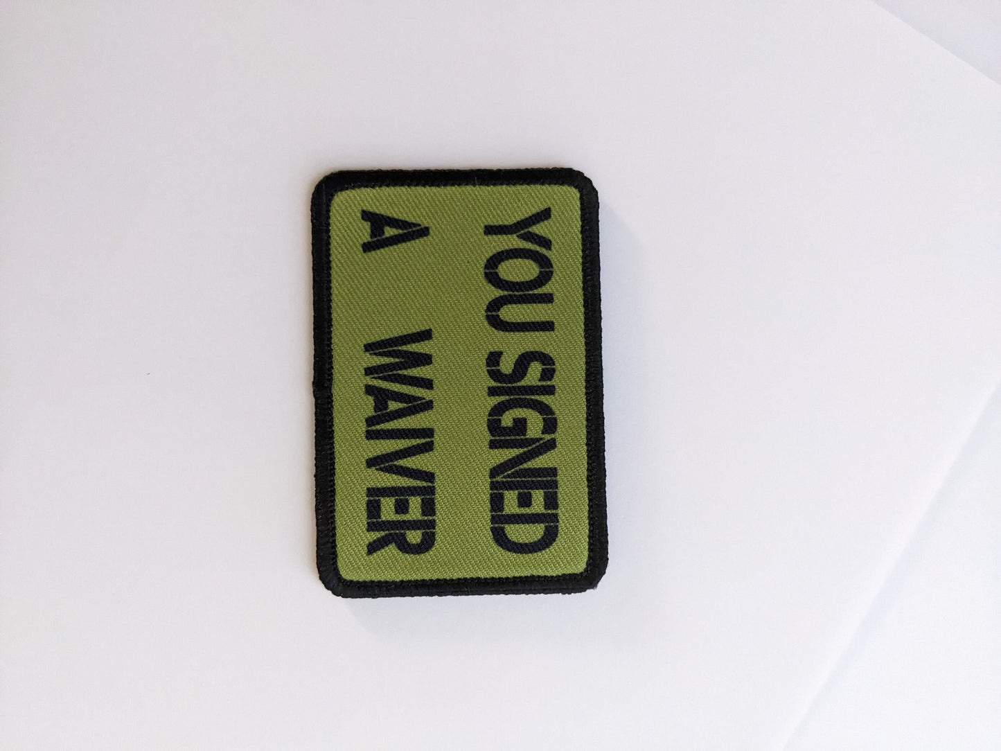You signed a waiver  removable patch 2"x3" morale patch with hook and loop backing