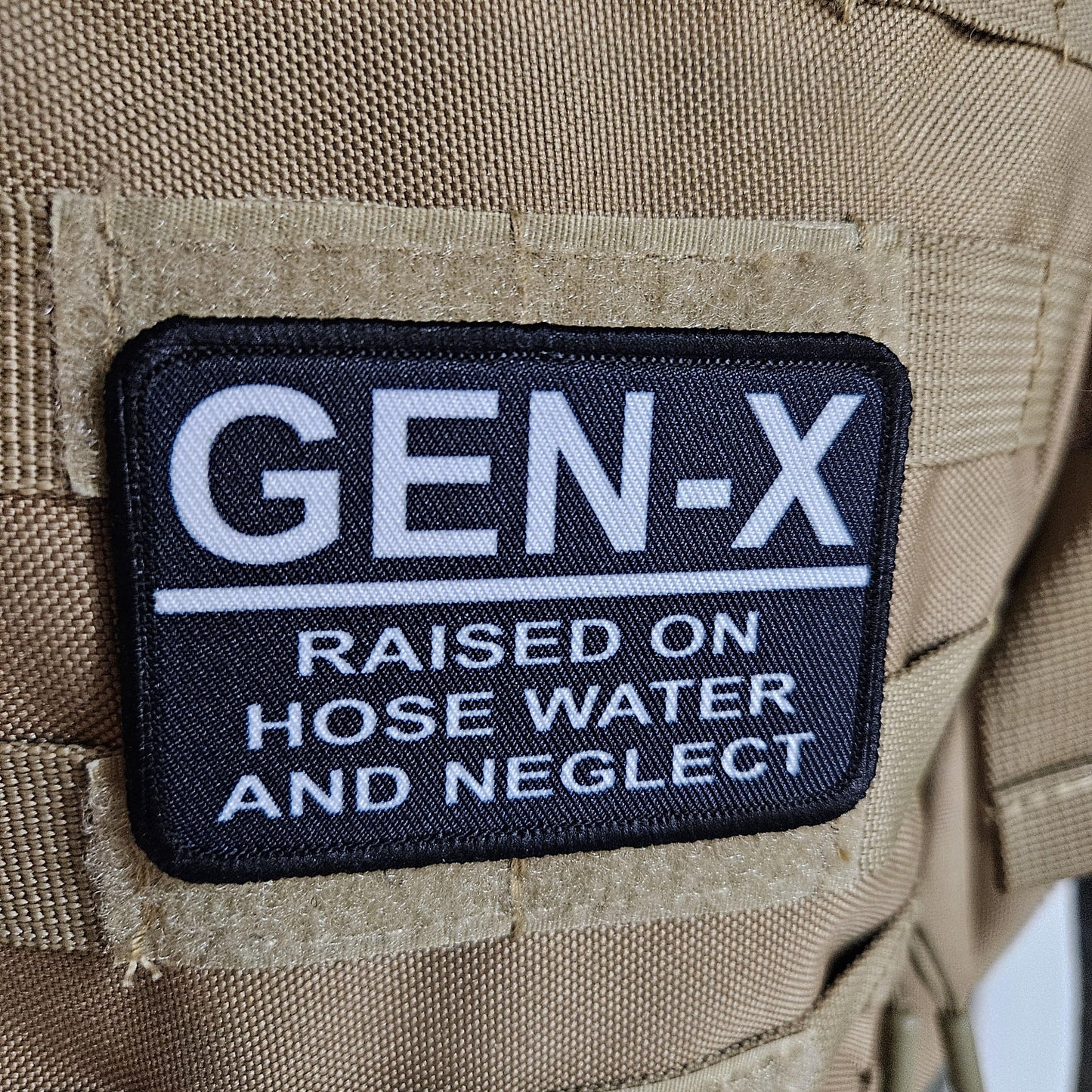 Gen x raised on hose water and neglect meme 2"x3" morale patch with hook and loop backing