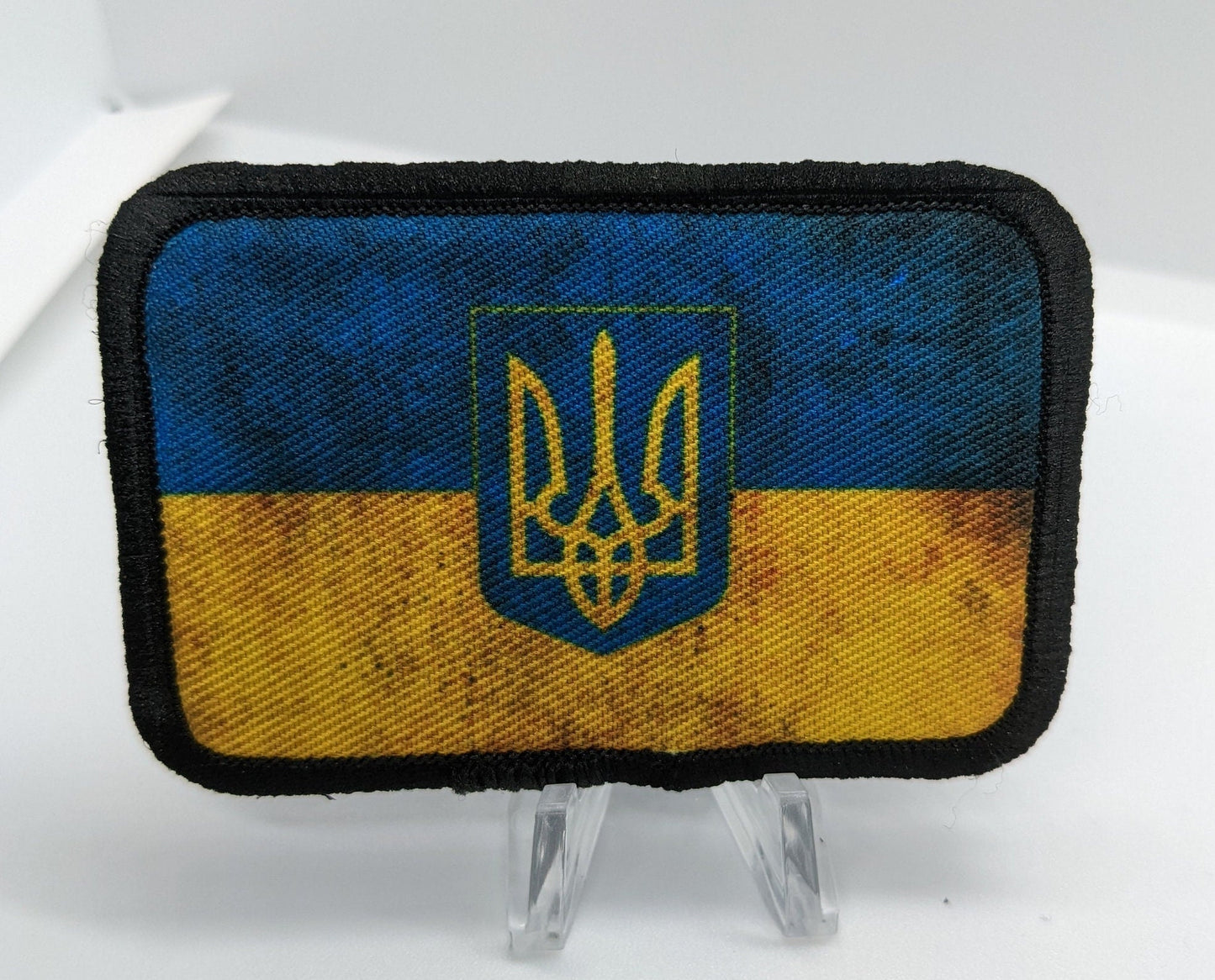 distressed Trident Ukraine Flag Military stand with Ukraine 2"x3" morale patch with hook and loop backing