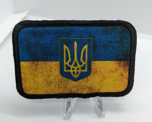 distressed Trident Ukraine Flag Military stand with Ukraine 2"x3" morale patch with hook and loop backing