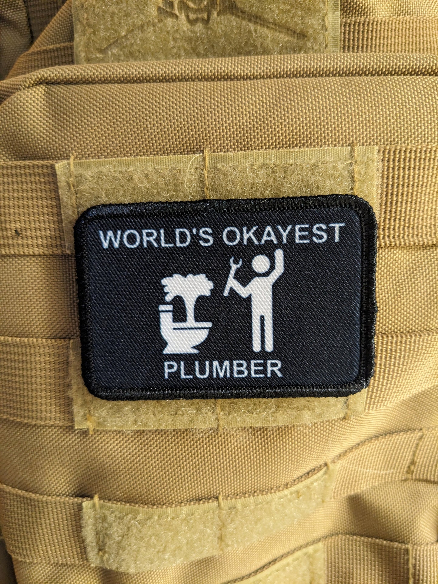 World's okayest plumber blue collar welding 2"x3" morale patch with hook and loop backing