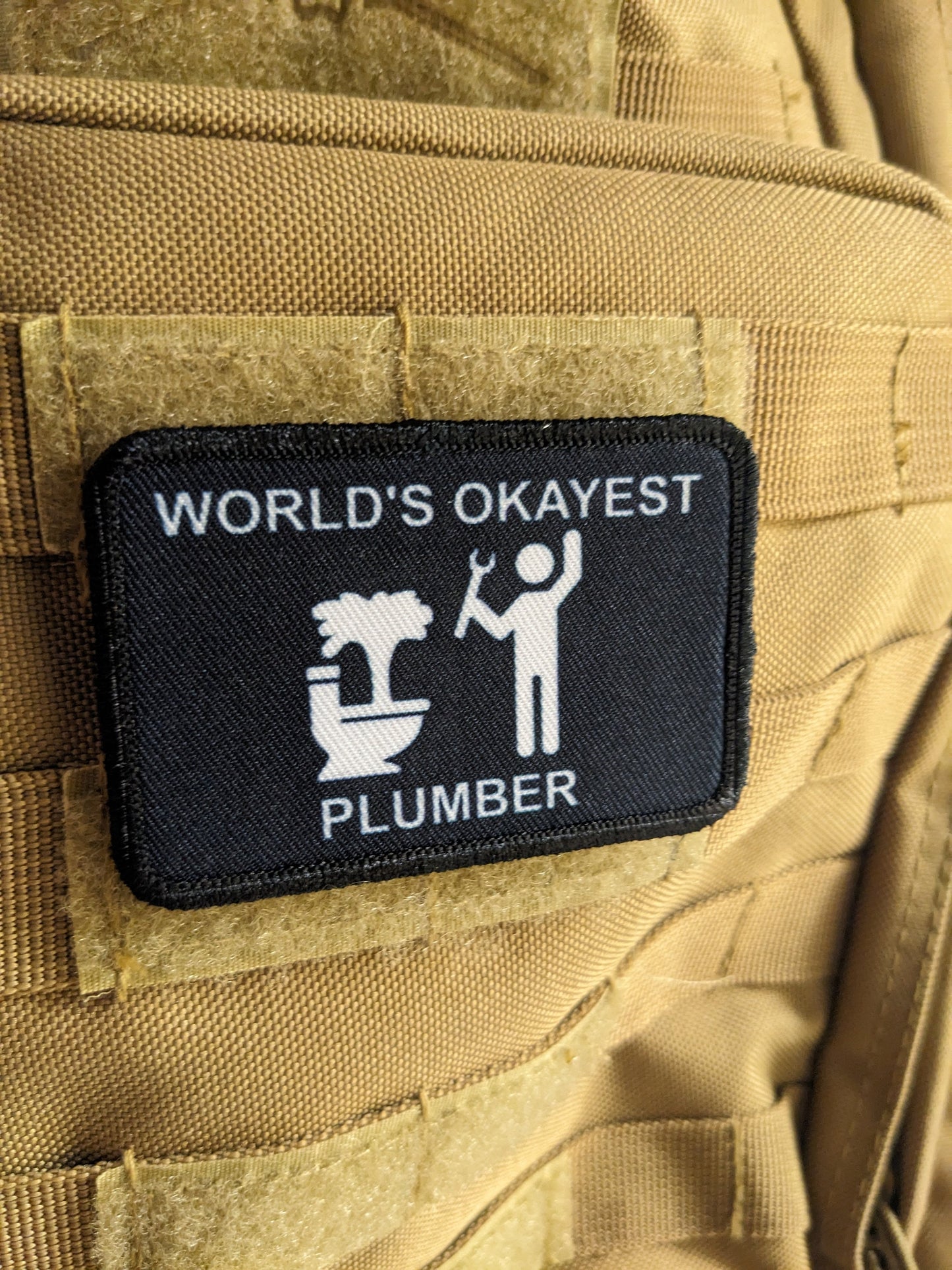 World's okayest plumber blue collar welding 2"x3" morale patch with hook and loop backing