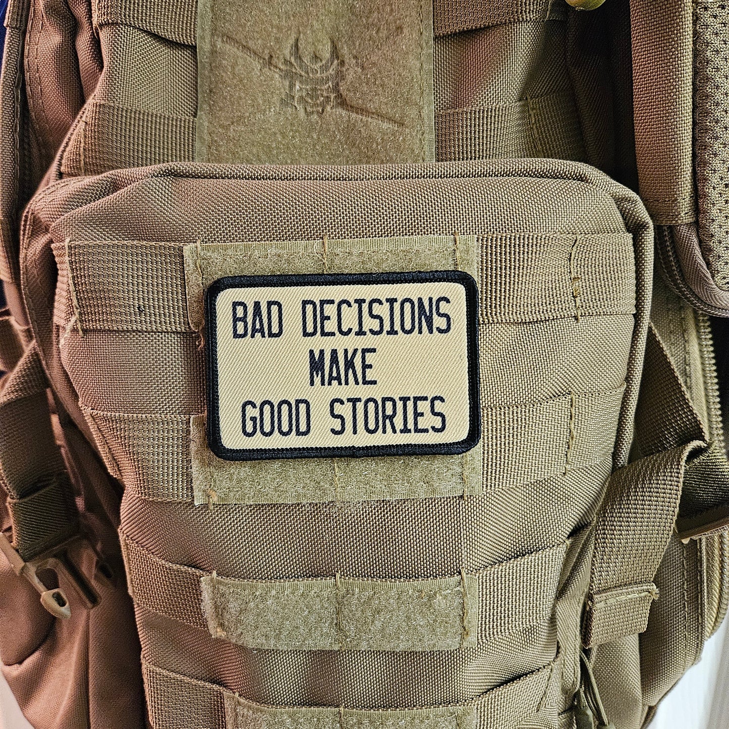 Bad decisions make good stories funny meme  2"x3" removable morale patch with hook and loop backing tan