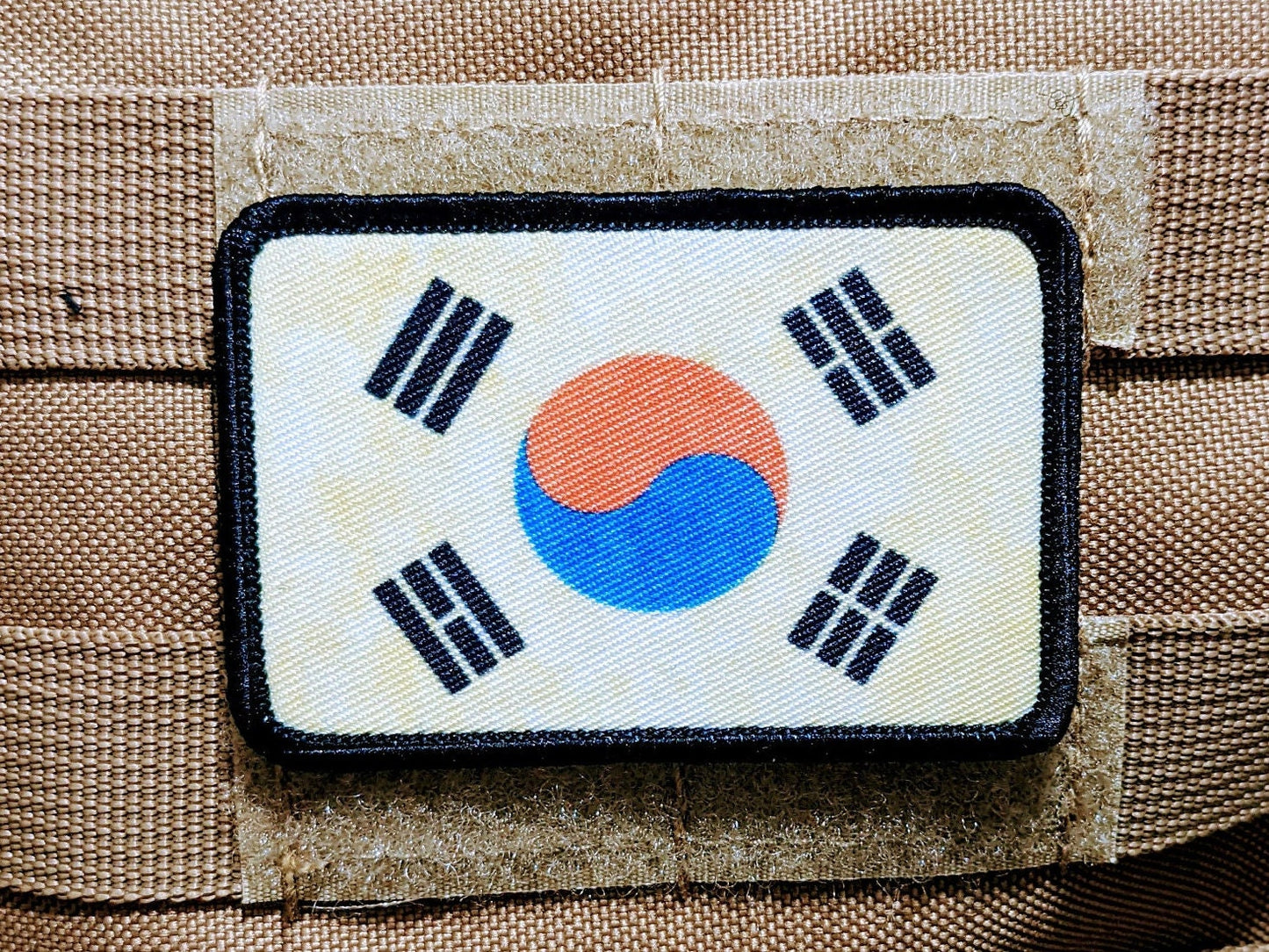 Worn/distressed South Korean flag 2"x3" morale patch with hook and loop backing
