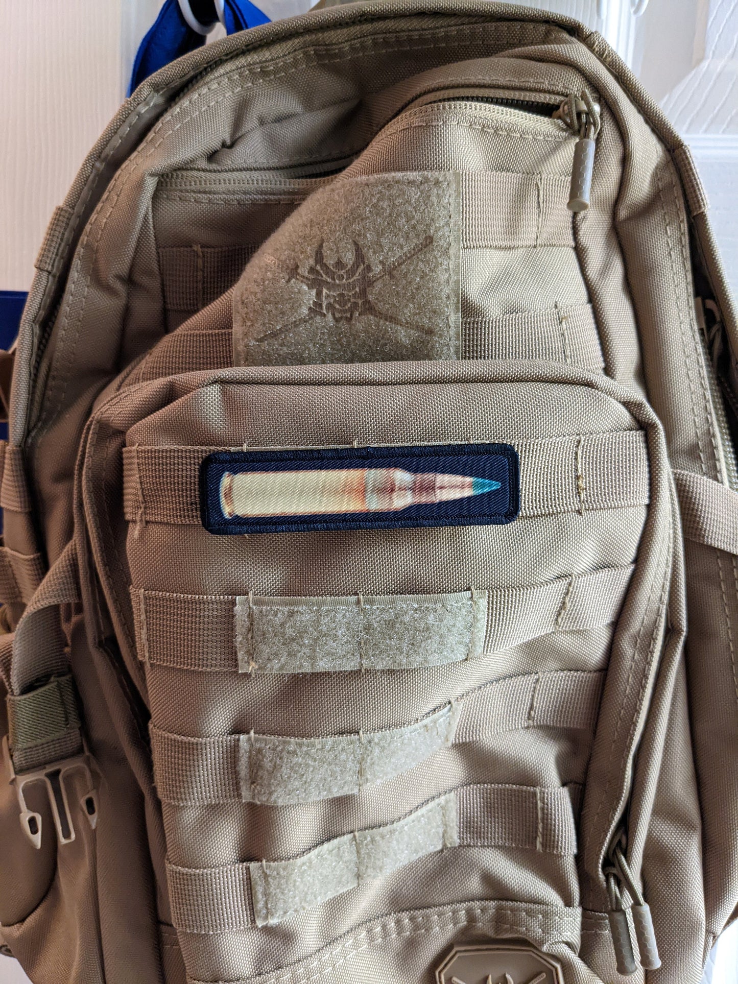 556 green tip round military 1"x4" removable morale patch with hook and loop backing good for back of operator hats