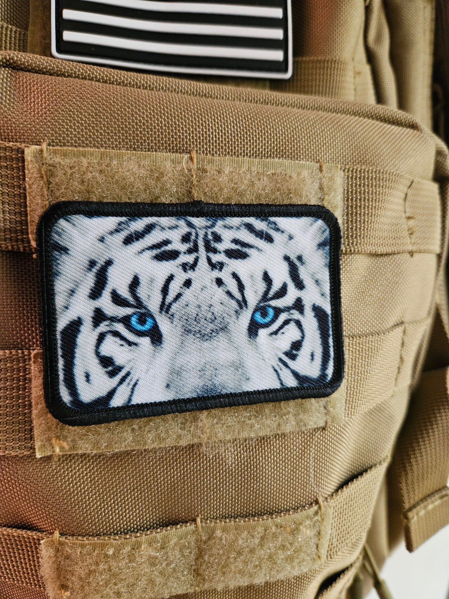 White tiger eyes 2"x3" morale patch with hook and loop backing