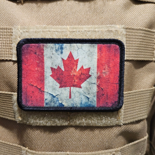 Distressed Canadian maple leaf flag 2"x3" morale patch with hook and loop backing