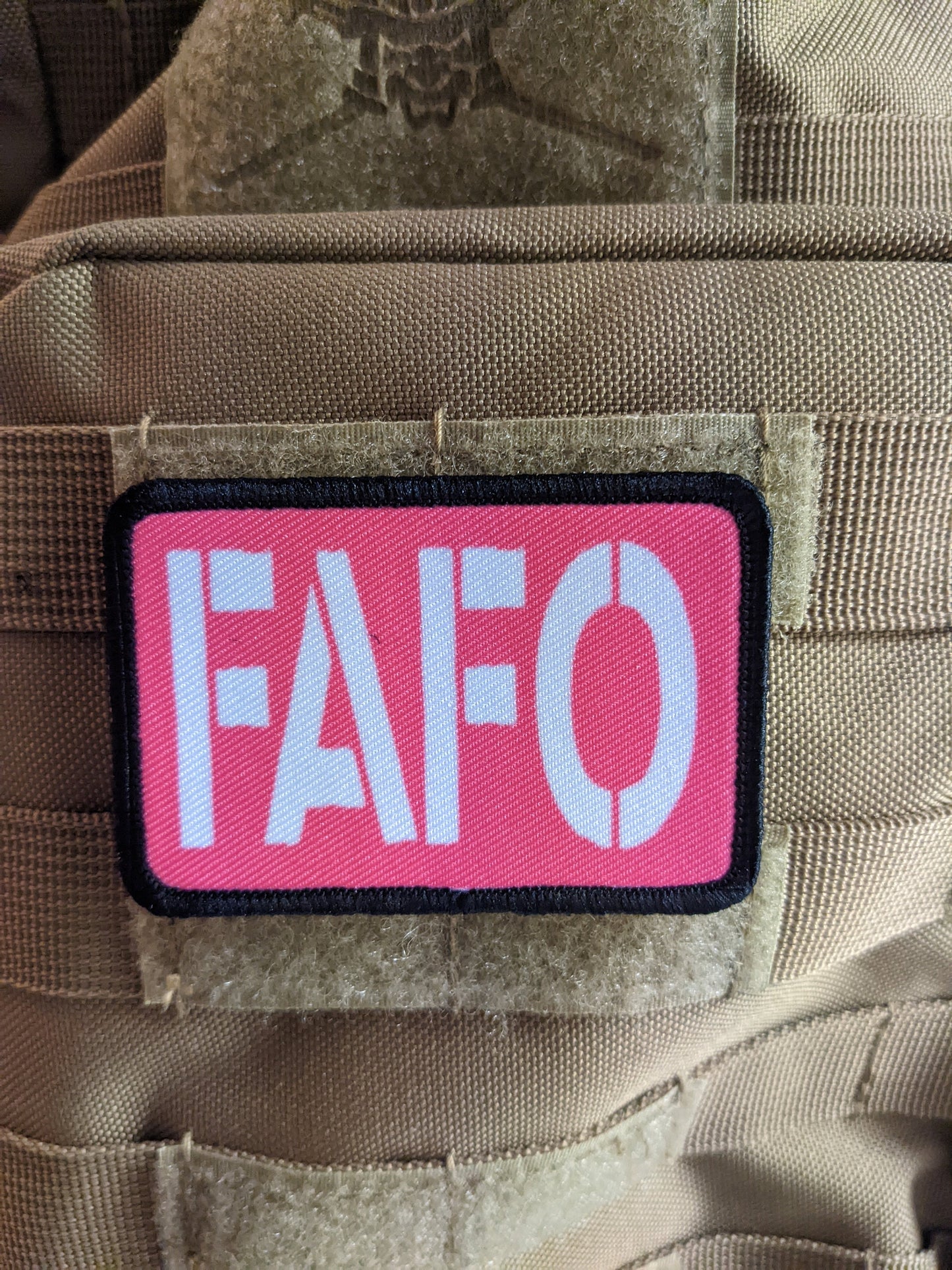 Fuck around and find out pink funny 2"x3" morale patch with hook and loop backing green background