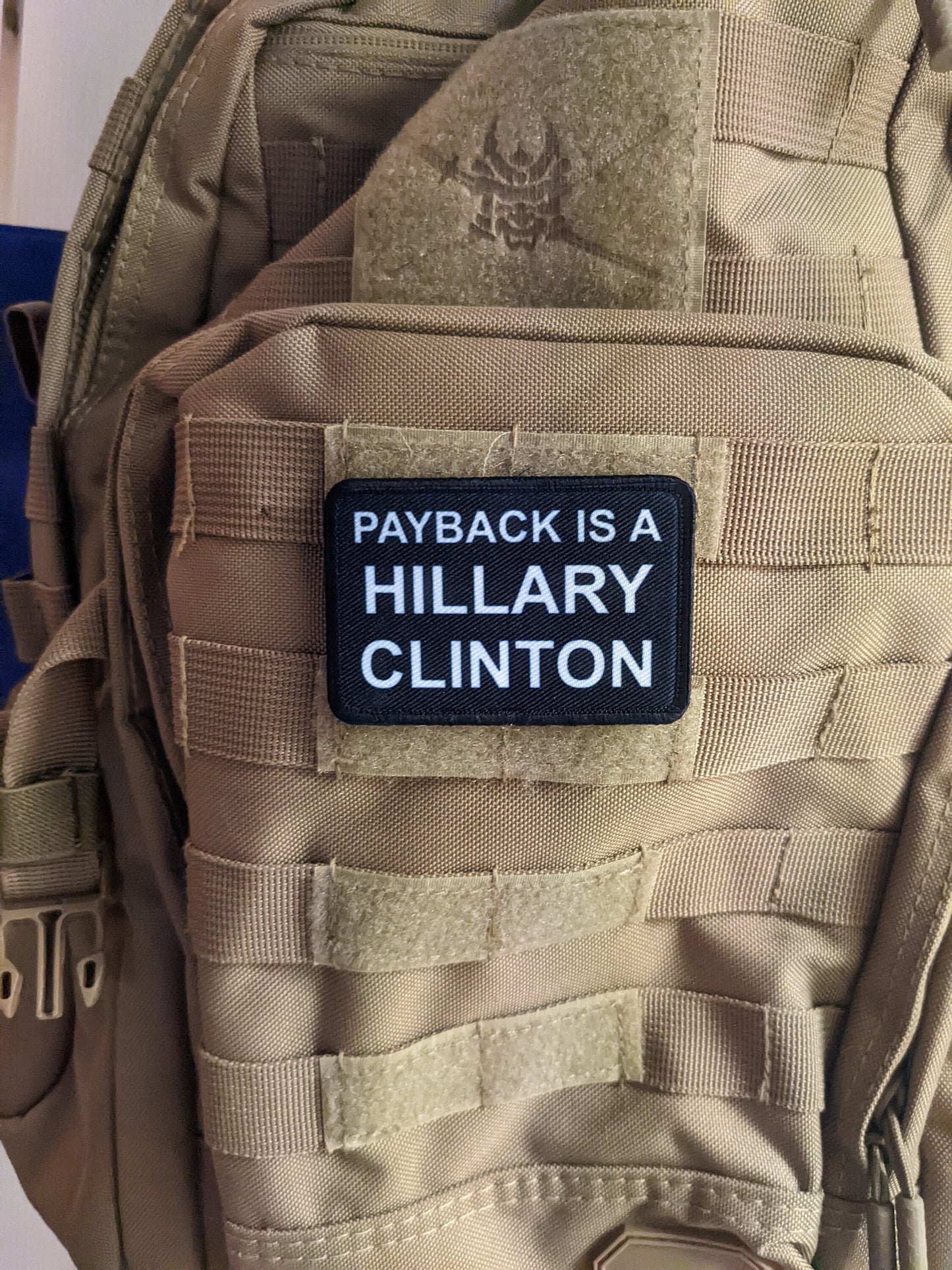 Payback is a Hillary Clinton (bitch) 2"x3" morale patch with hook and loop backing