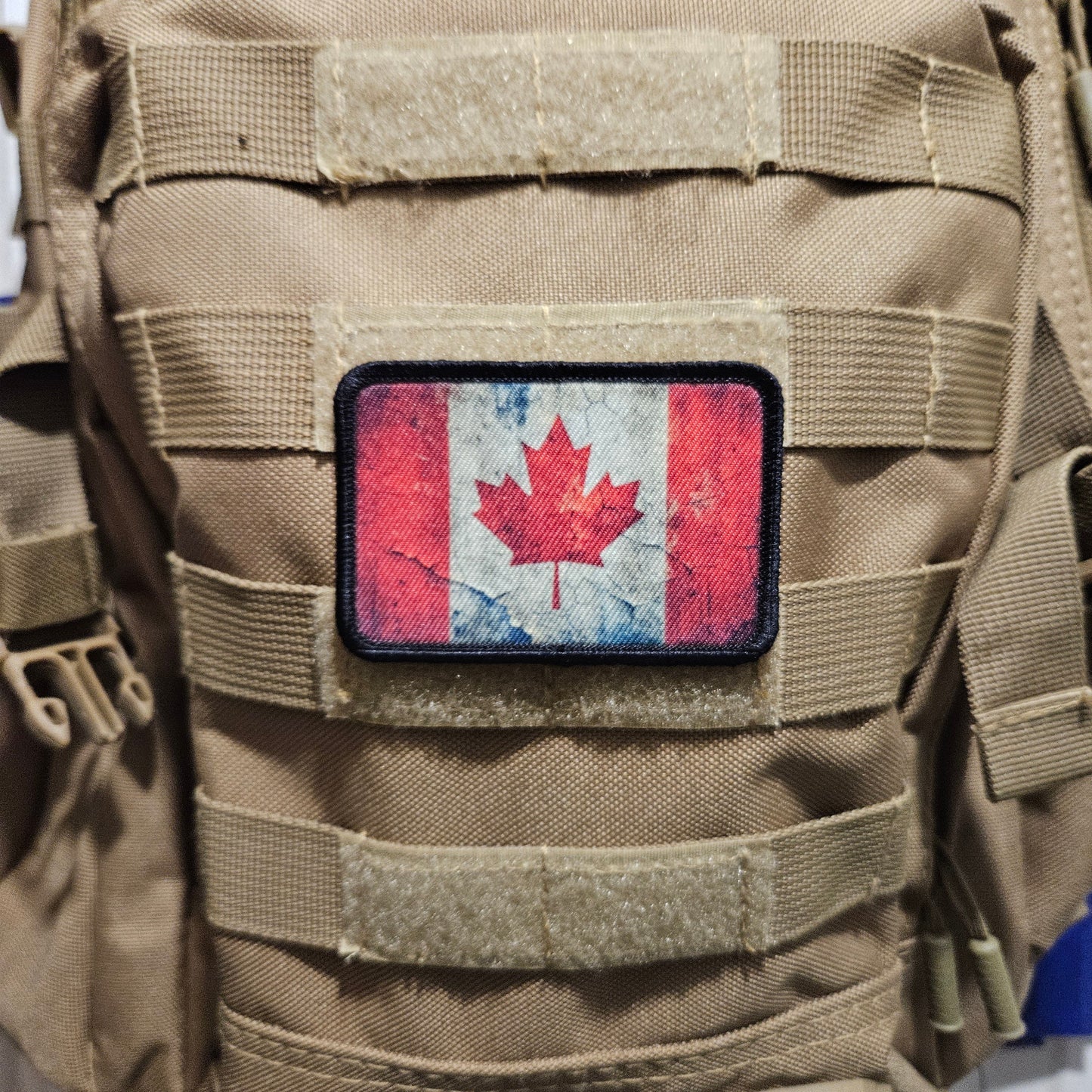 Distressed Canadian maple leaf flag 2"x3" morale patch with hook and loop backing