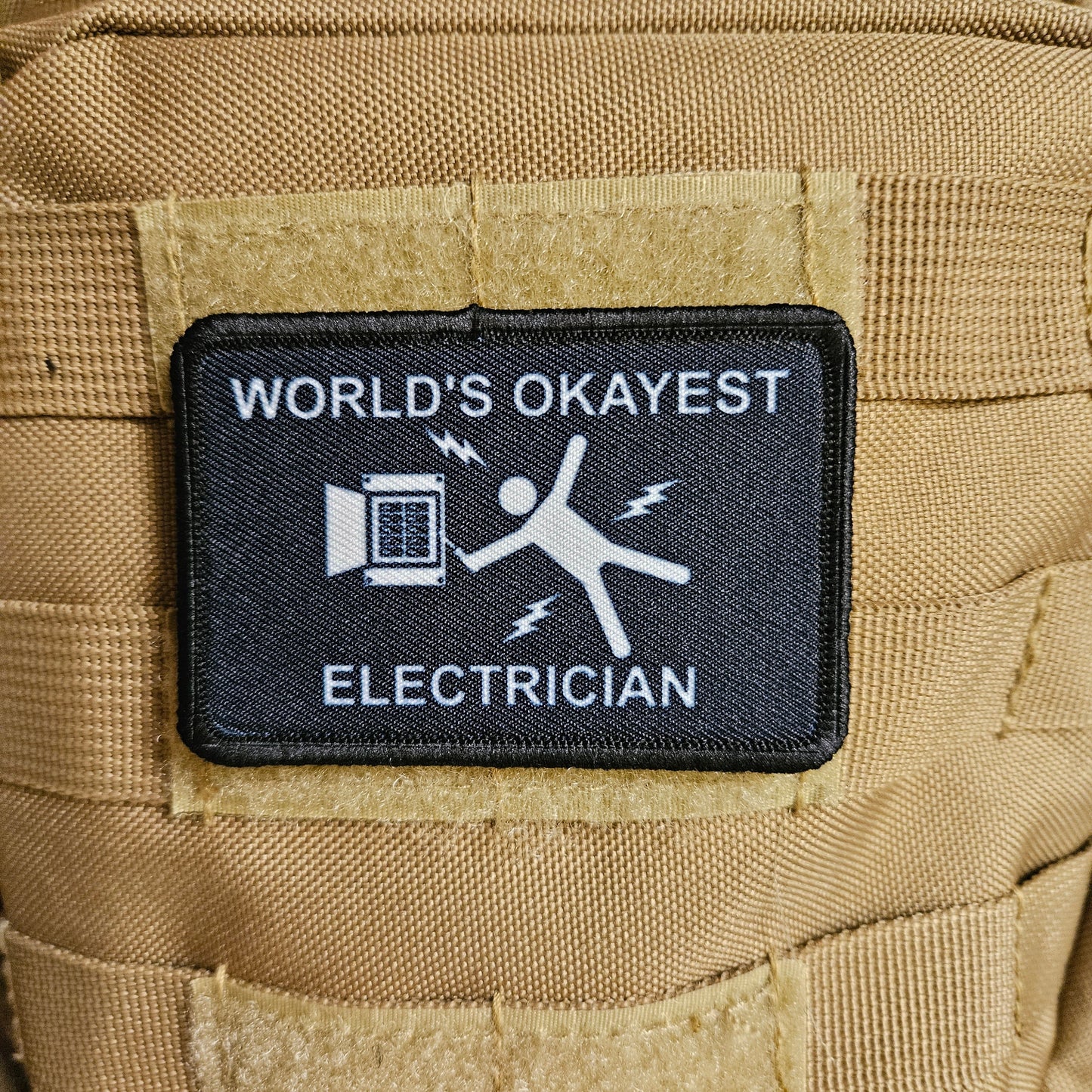 World's okayest electrician blue collar 2"x3" morale patch with hook and loop backing