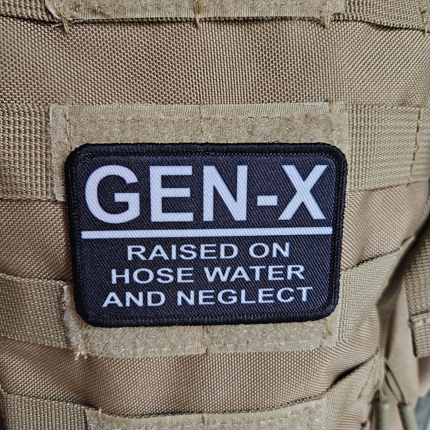 Gen x raised on hose water and neglect meme 2"x3" morale patch with hook and loop backing