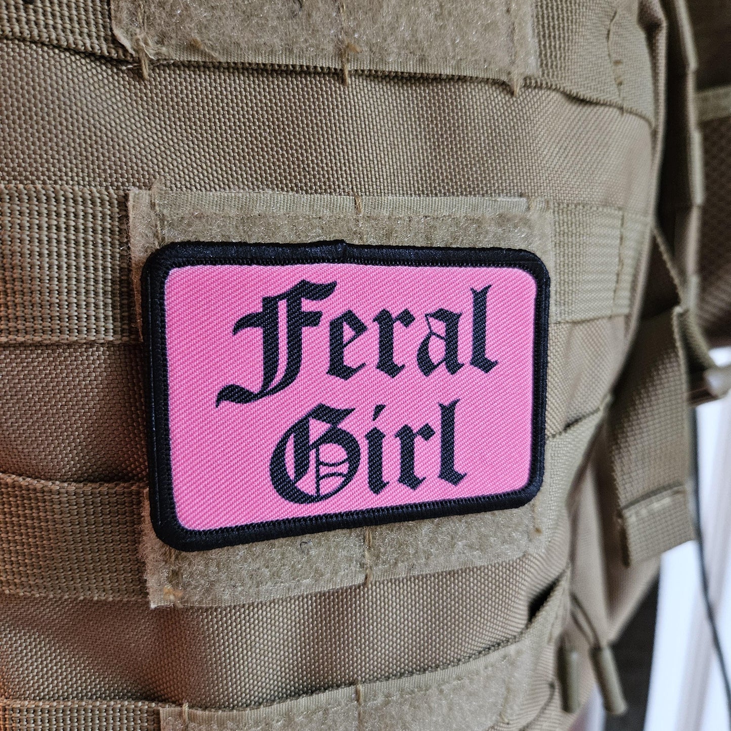 Pink "feral girl" girls and boys meme 2"x3" morale patch with hook and loop backing