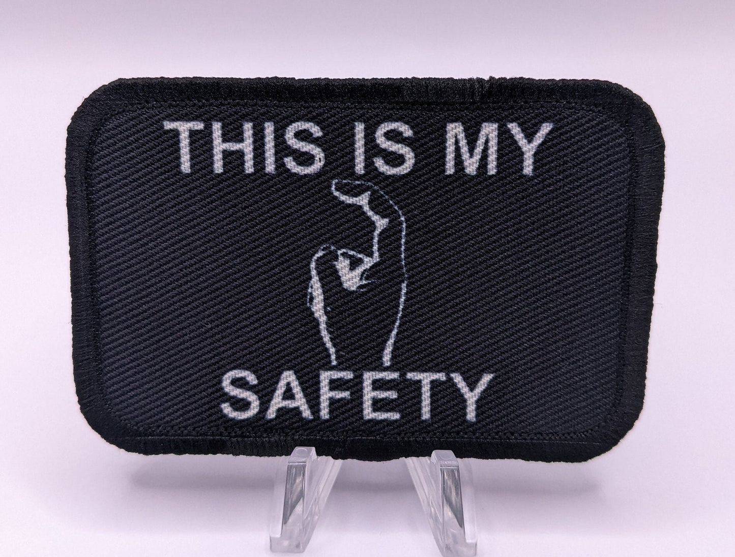 This is my Safety sir black and white 2"x3" morale patch with hook and loop backing