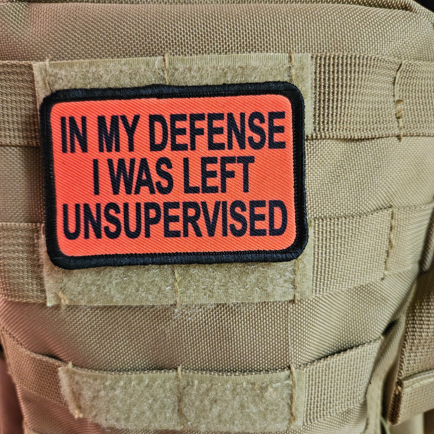 Red In My Defense I was left Unsupervised  removable patch 2"x3" morale patch with hook and loop backing