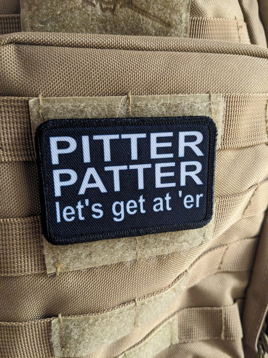 Pitter patter let's get at 'er meme 2"x3" removable morale patch with hook and loop backing black and white