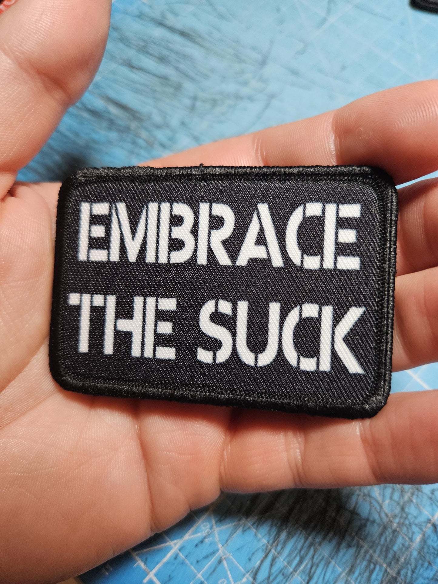 EMBRACE THE SUCK army military navy funny 2"x3" morale patch with hook and loop backing green background