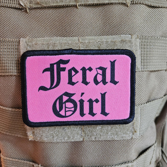 Pink "feral girl" girls and boys meme 2"x3" morale patch with hook and loop backing