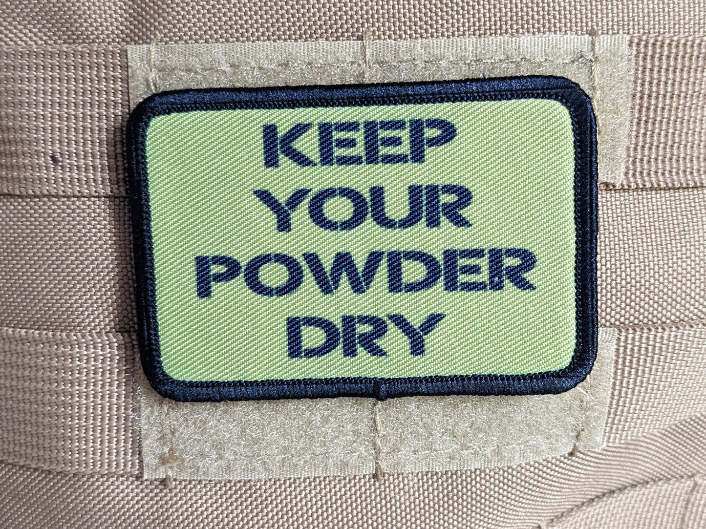 Keep your powder dry olive green 2"x3" morale patch with hook and loop backing military