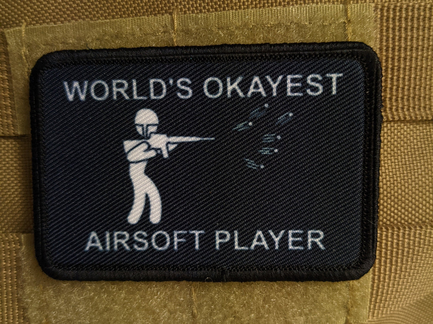World's Okayest airsoft player funny meme 2"x3" morale patch with hook and loop backing
