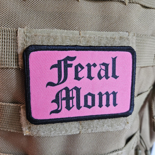 Pink "feral mom" girls and boys meme 2"x3" morale patch with hook and loop backing