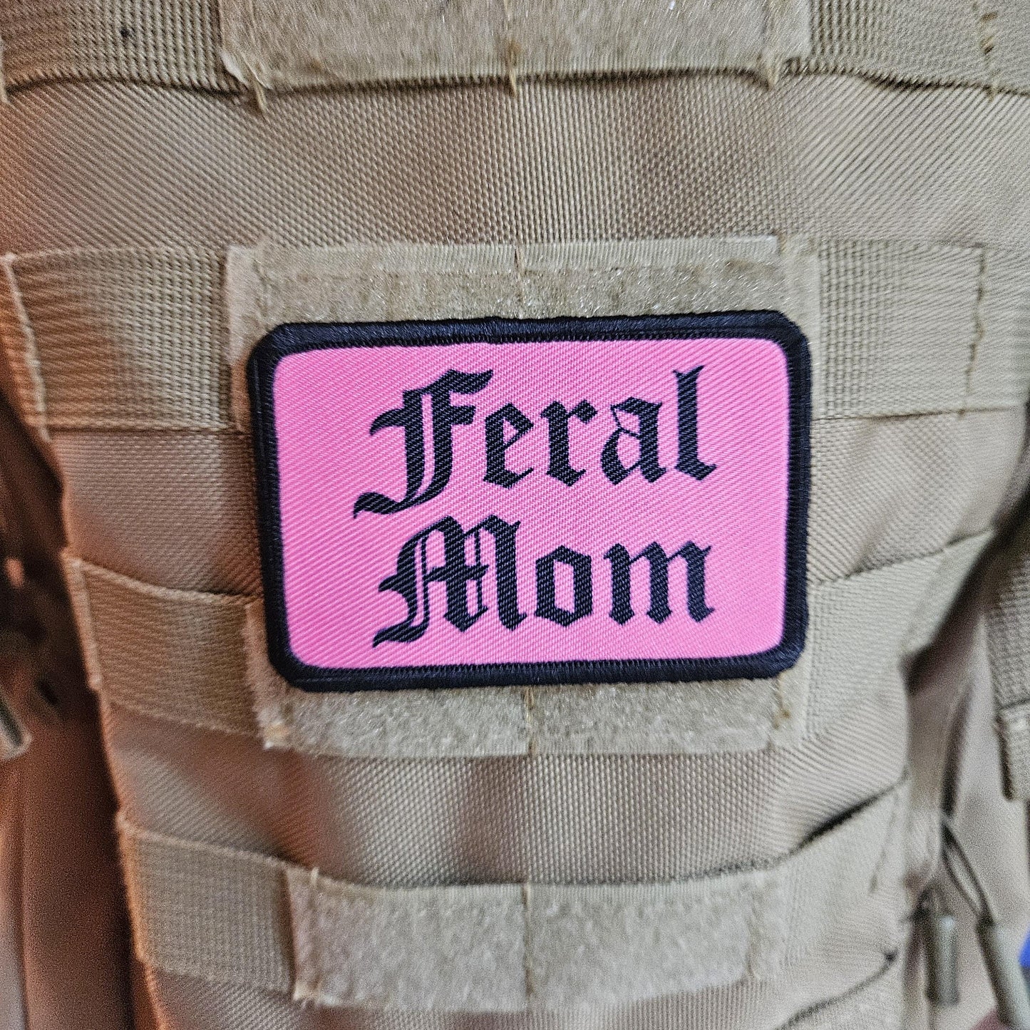 Pink "feral mom" girls and boys meme 2"x3" morale patch with hook and loop backing