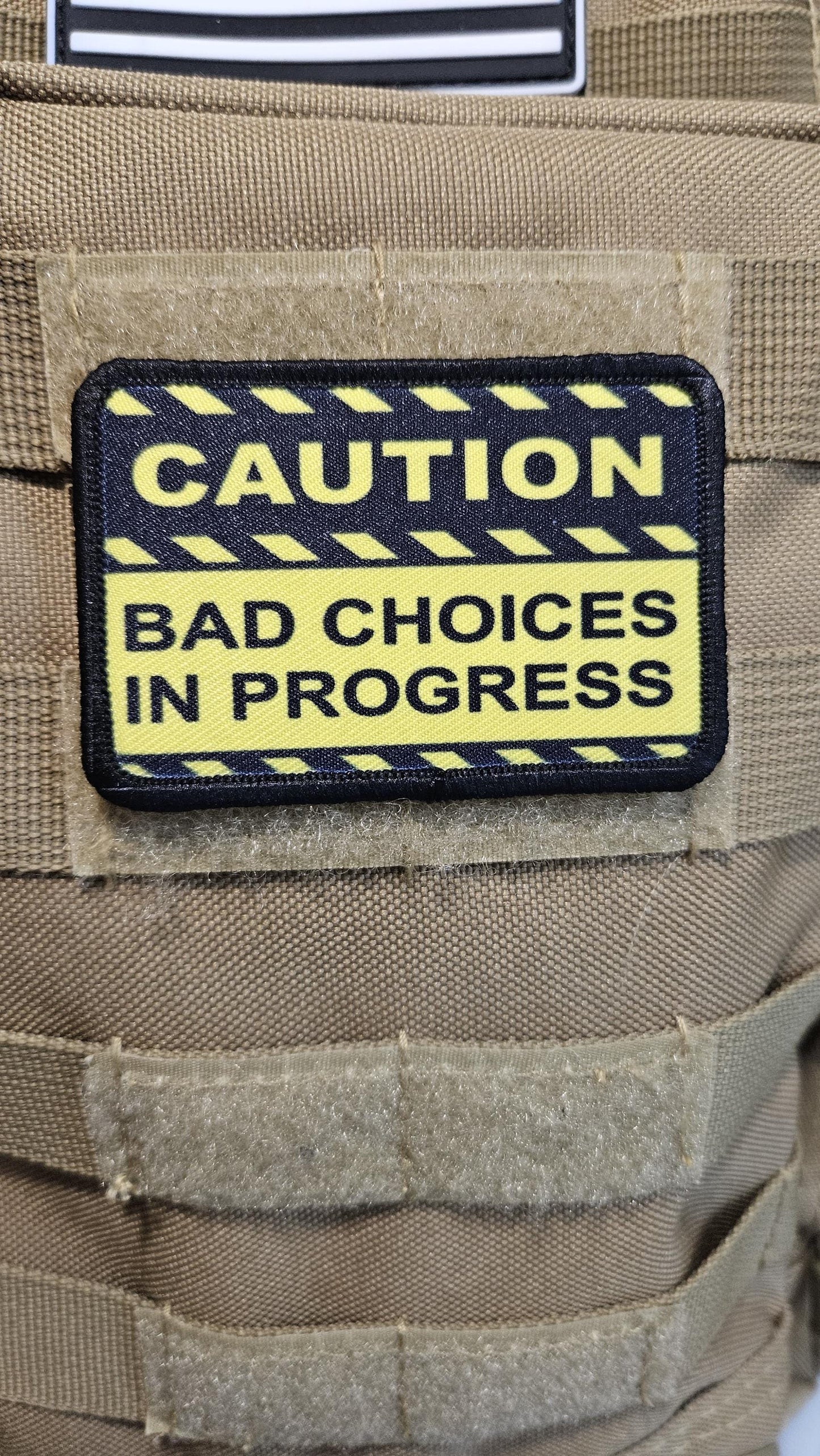 Caution bad choices in progress meme  2"x3" removable morale patch with hook and loop backing
