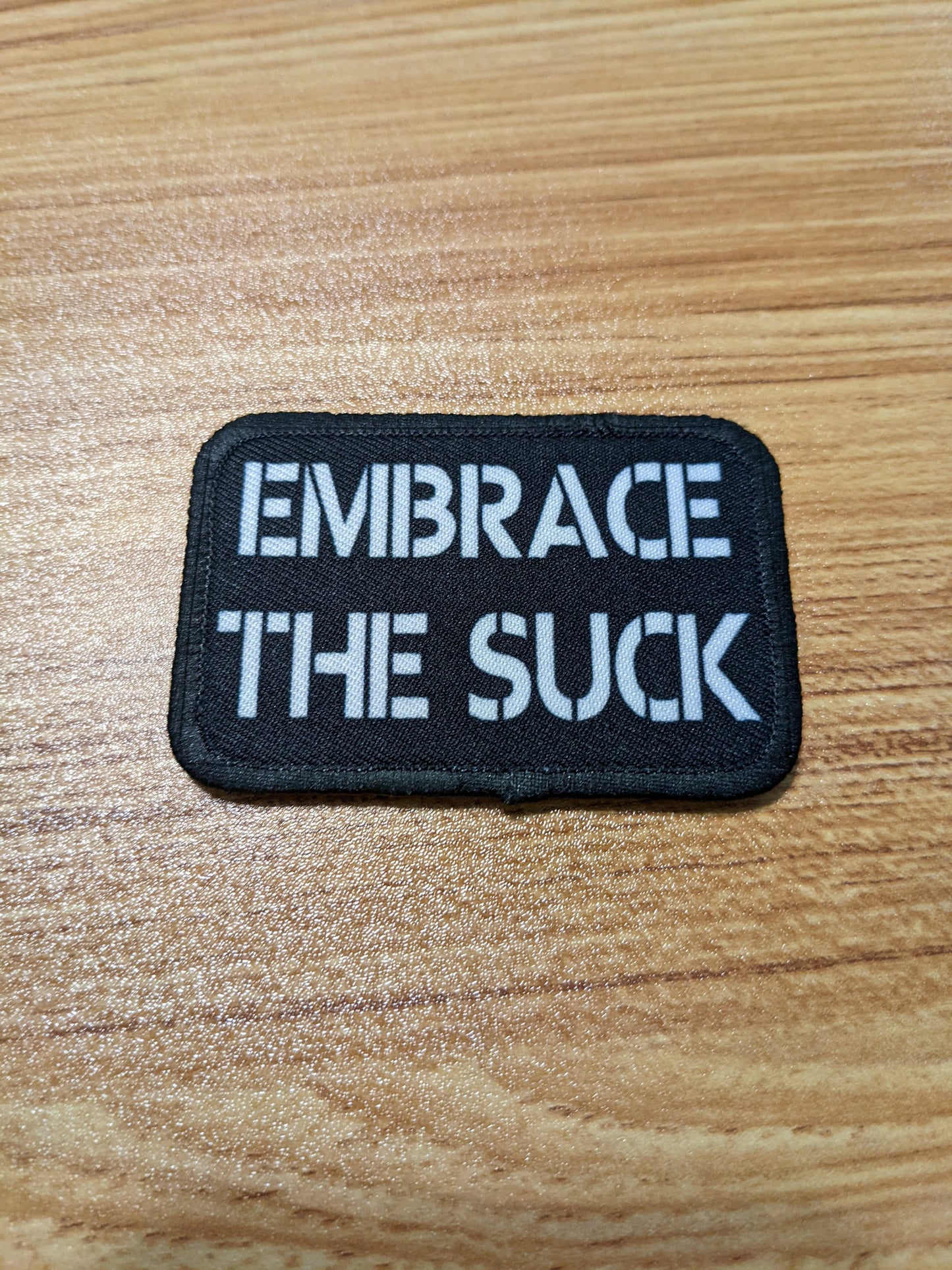 EMBRACE THE SUCK army military navy funny 2"x3" morale patch with hook and loop backing green background