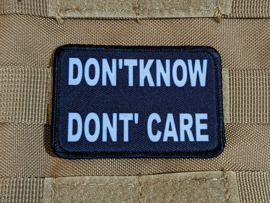 Don't Know Don't Care funny 2"x3" morale patch with hook and loop backing green background