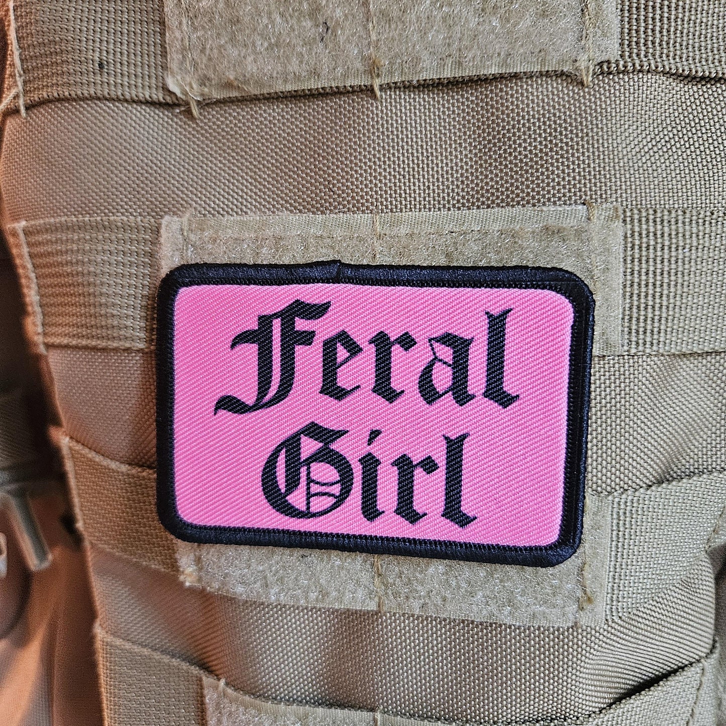 Pink "feral girl" girls and boys meme 2"x3" morale patch with hook and loop backing