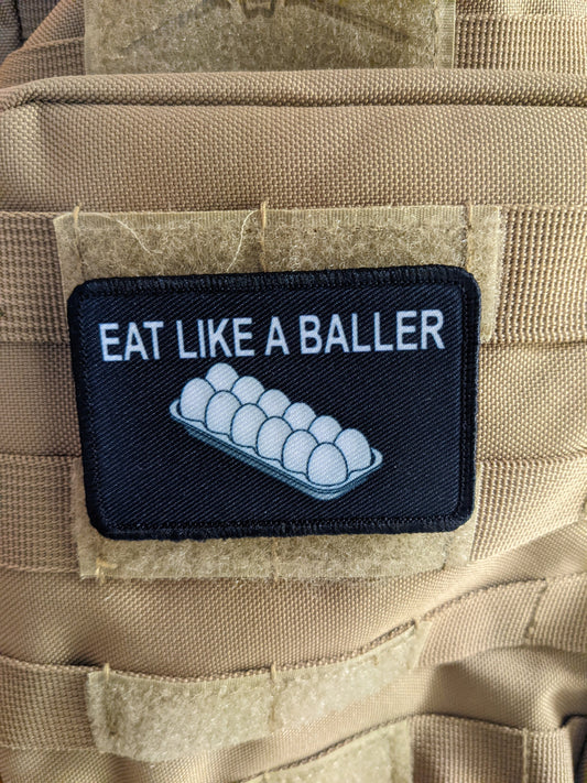 Eat like a baller egg shortage inflation meme  2"x3" removable morale patch with hook and loop backing