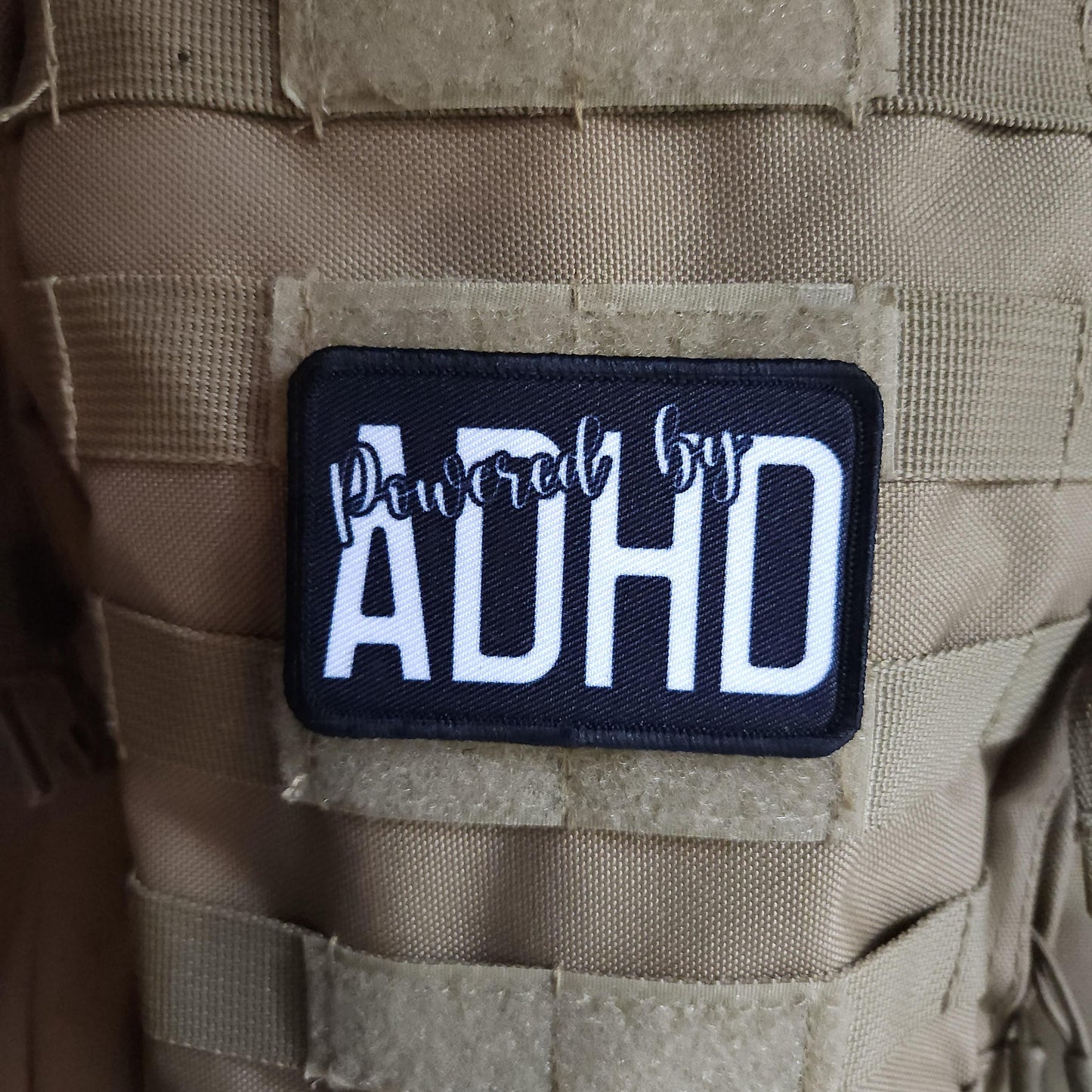 Powered by ADHD meme  2"x3" morale patch with hook and loop backing