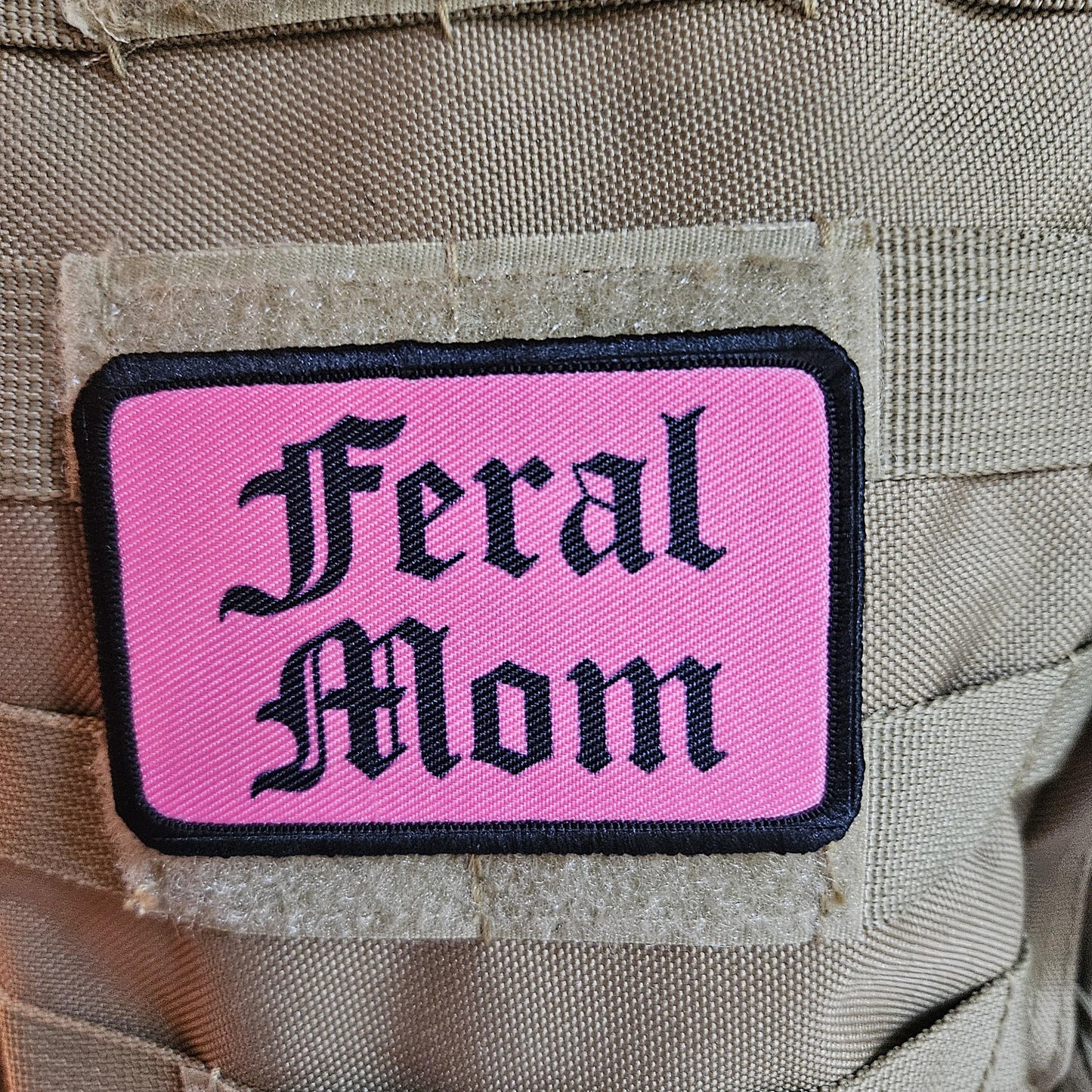 Pink "feral mom" girls and boys meme 2"x3" morale patch with hook and loop backing