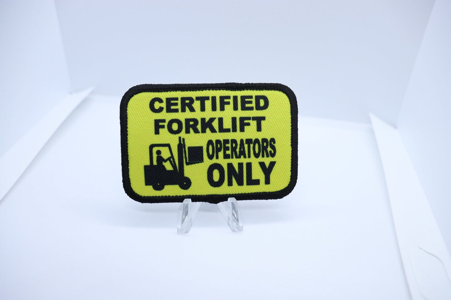 Certified Forklift operators only removable patch meme 2"x3" morale patch with hook and loop backing green background